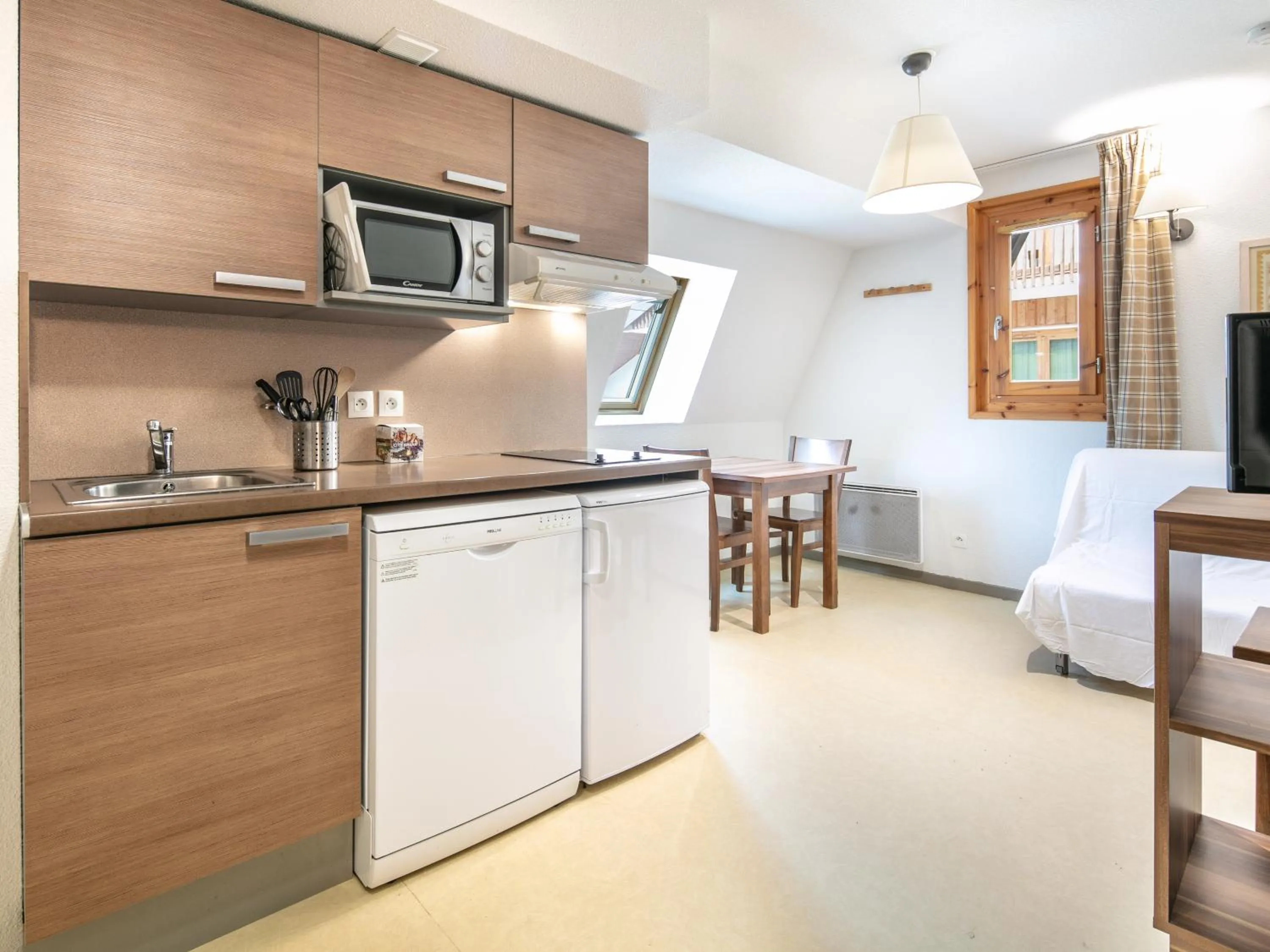 Kitchen or kitchenette in Vacancéole - Les Gentianes