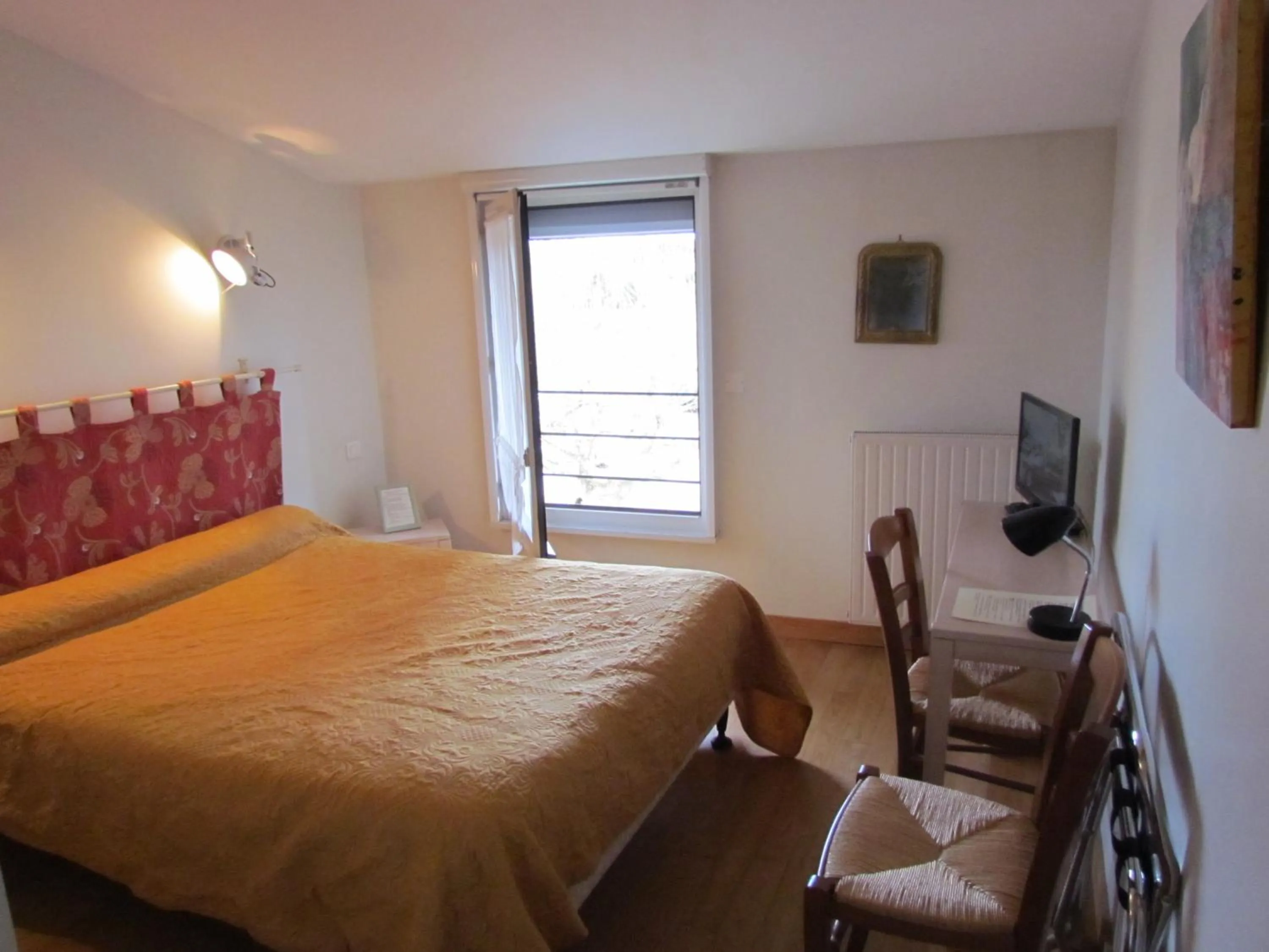 Bed in Le Relais de la Tour