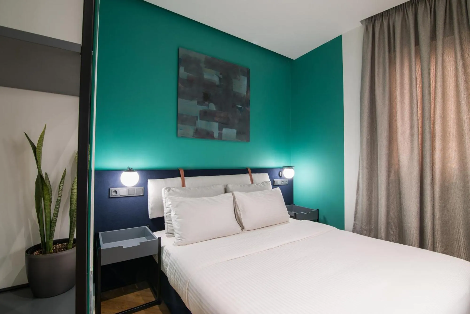 Bed in Ederlezi Zoubourlou Aparthotel