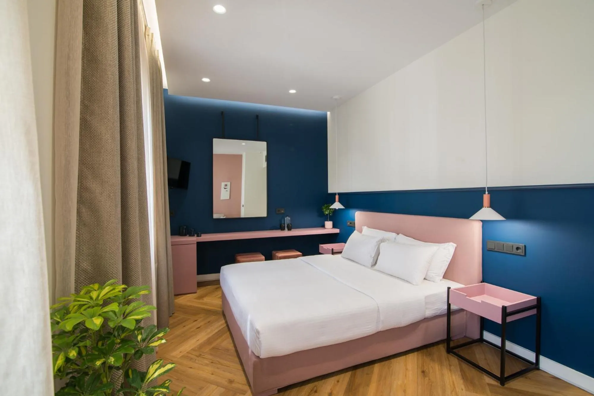 Bed in Ederlezi Zoubourlou Aparthotel