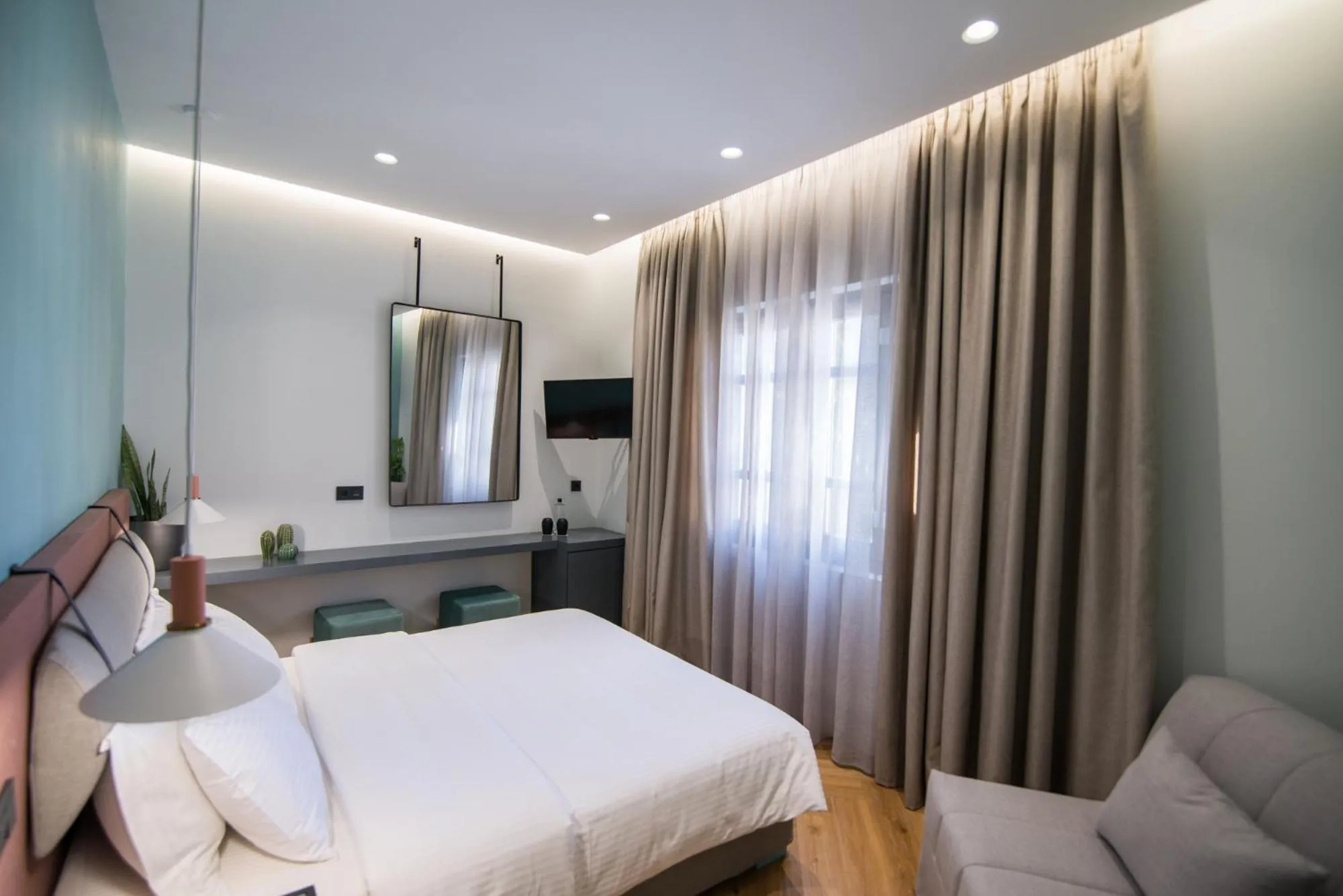 Bed in Ederlezi Zoubourlou Aparthotel