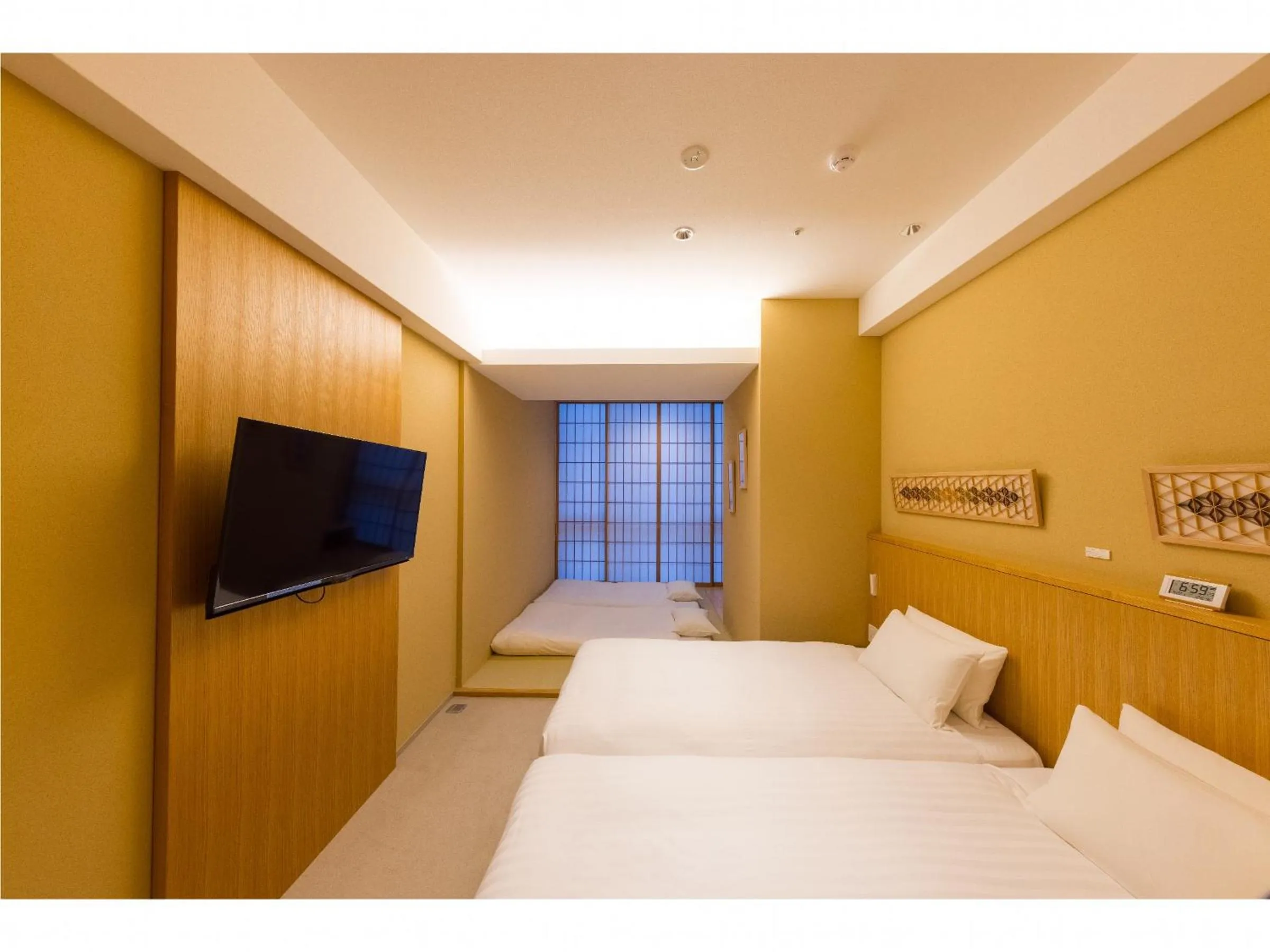 Bed in 9 HOTEL Hakata