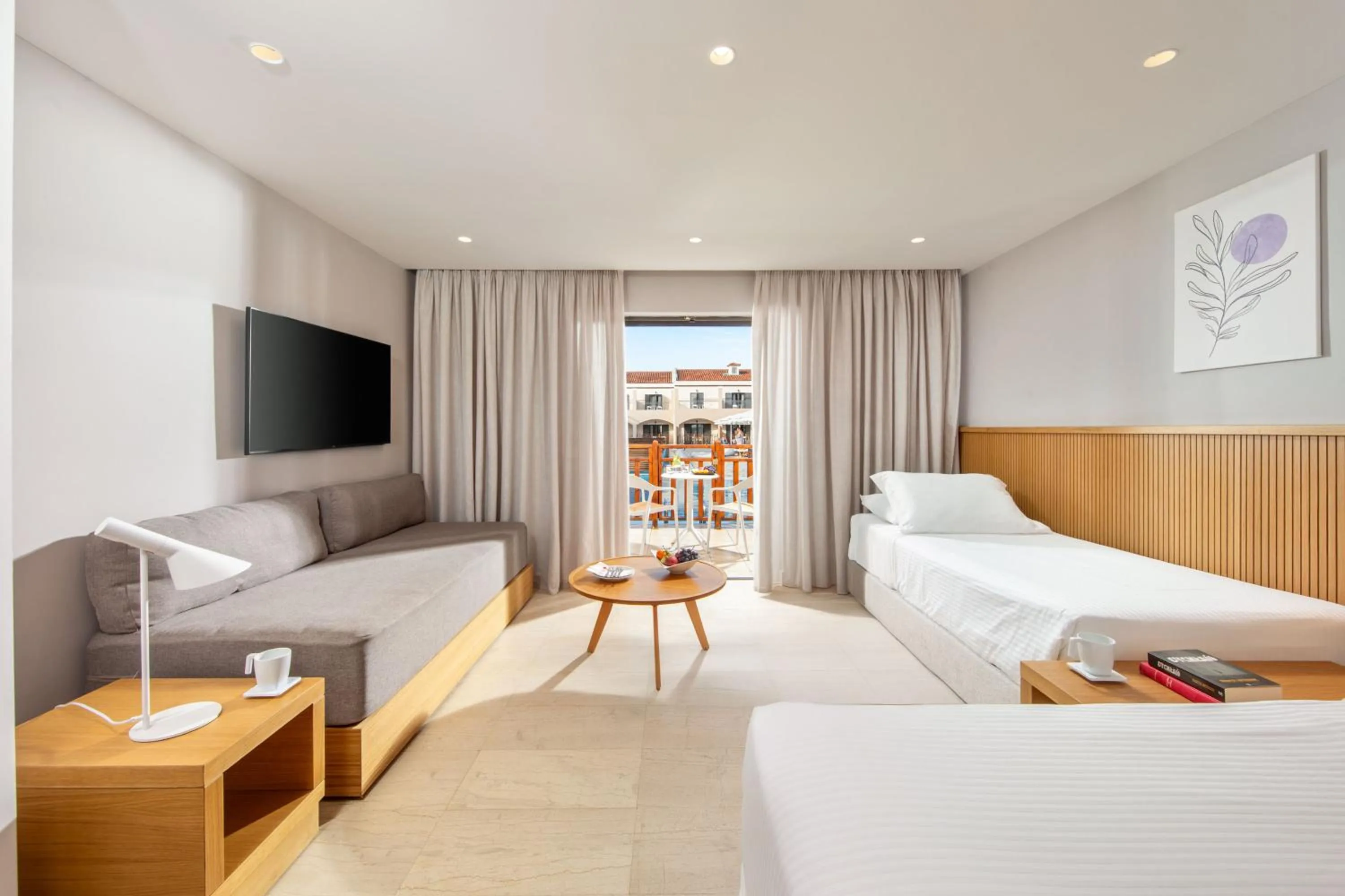 Bed in Roda Beach Resort & Spa