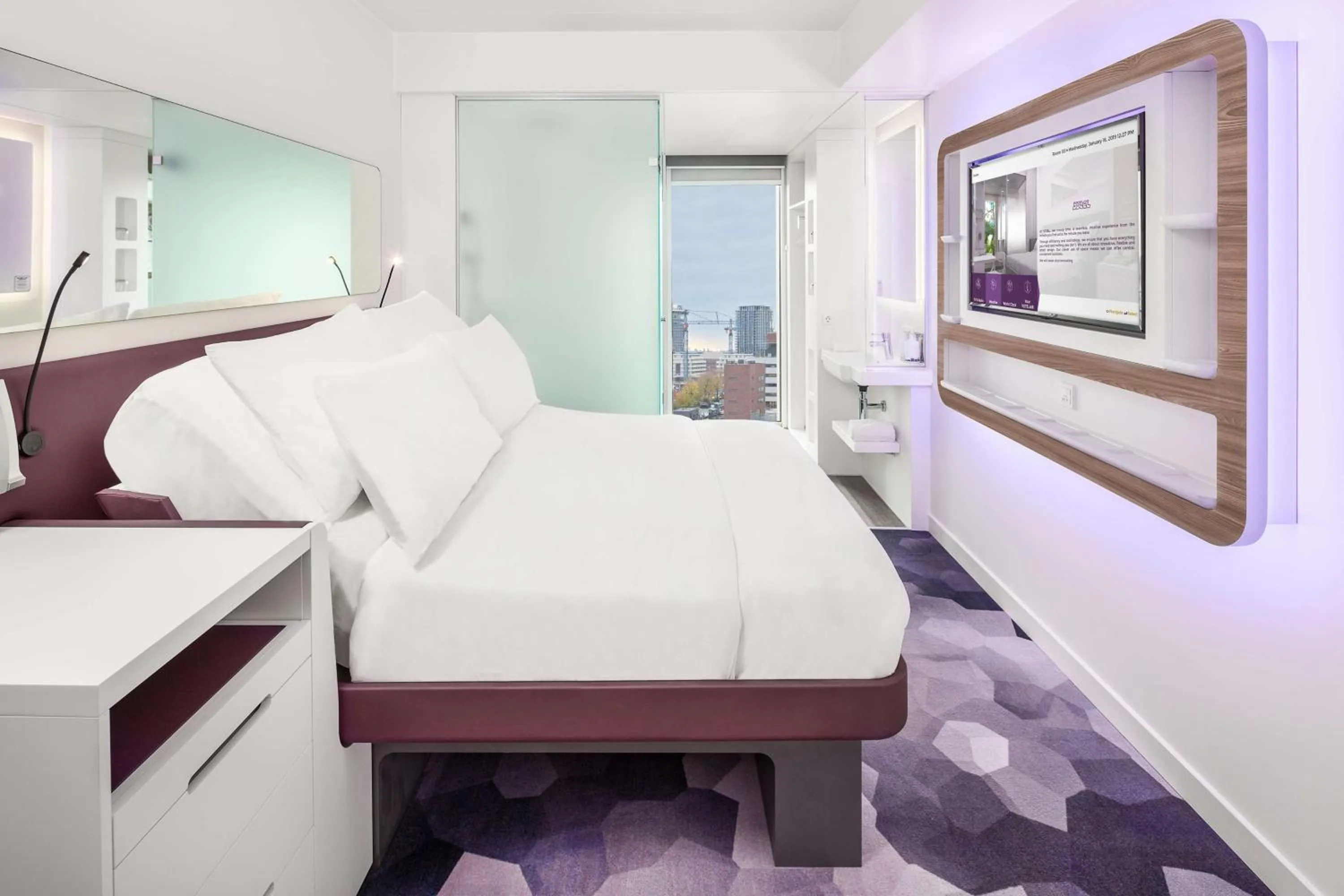 Photo of the whole room, Bed in YOTEL Amsterdam