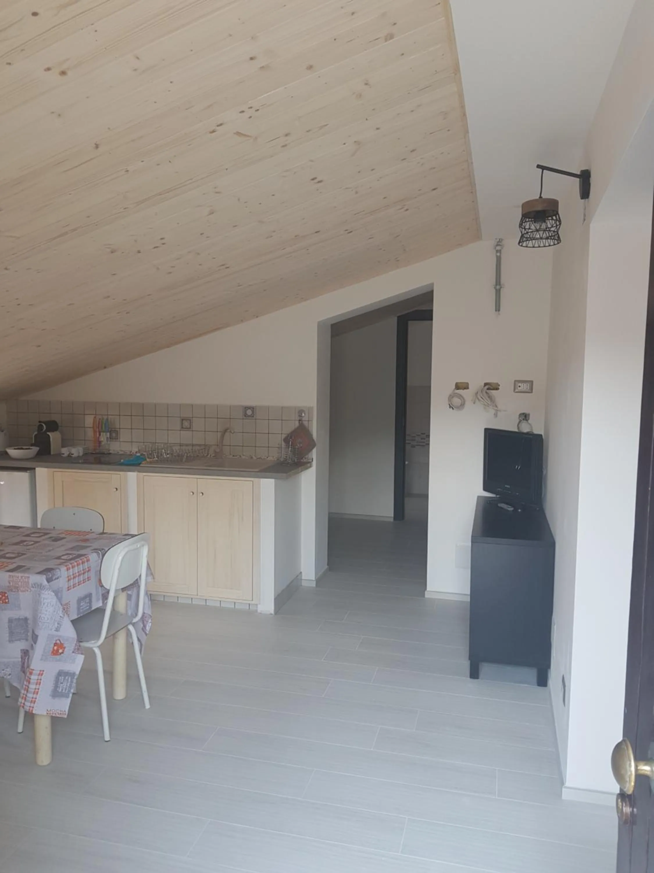 Communal lounge/ TV room in La Casetta di Vitty