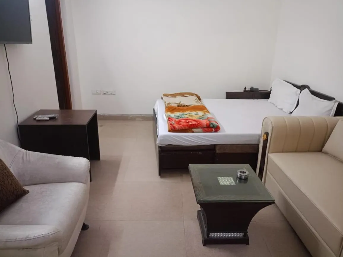 Bed in Hotel Home Stay Dwarka