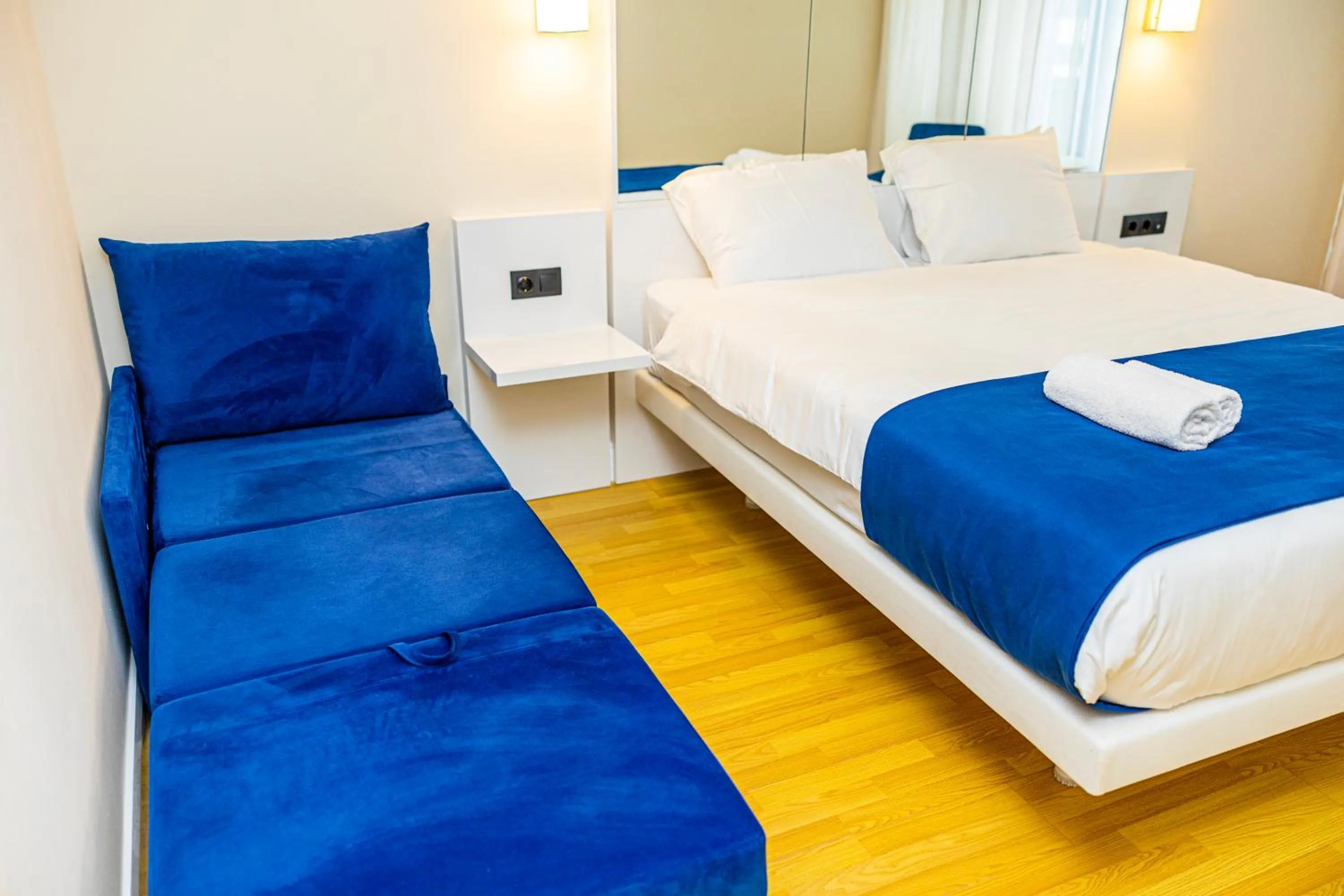 Bed in Orbi City Inn