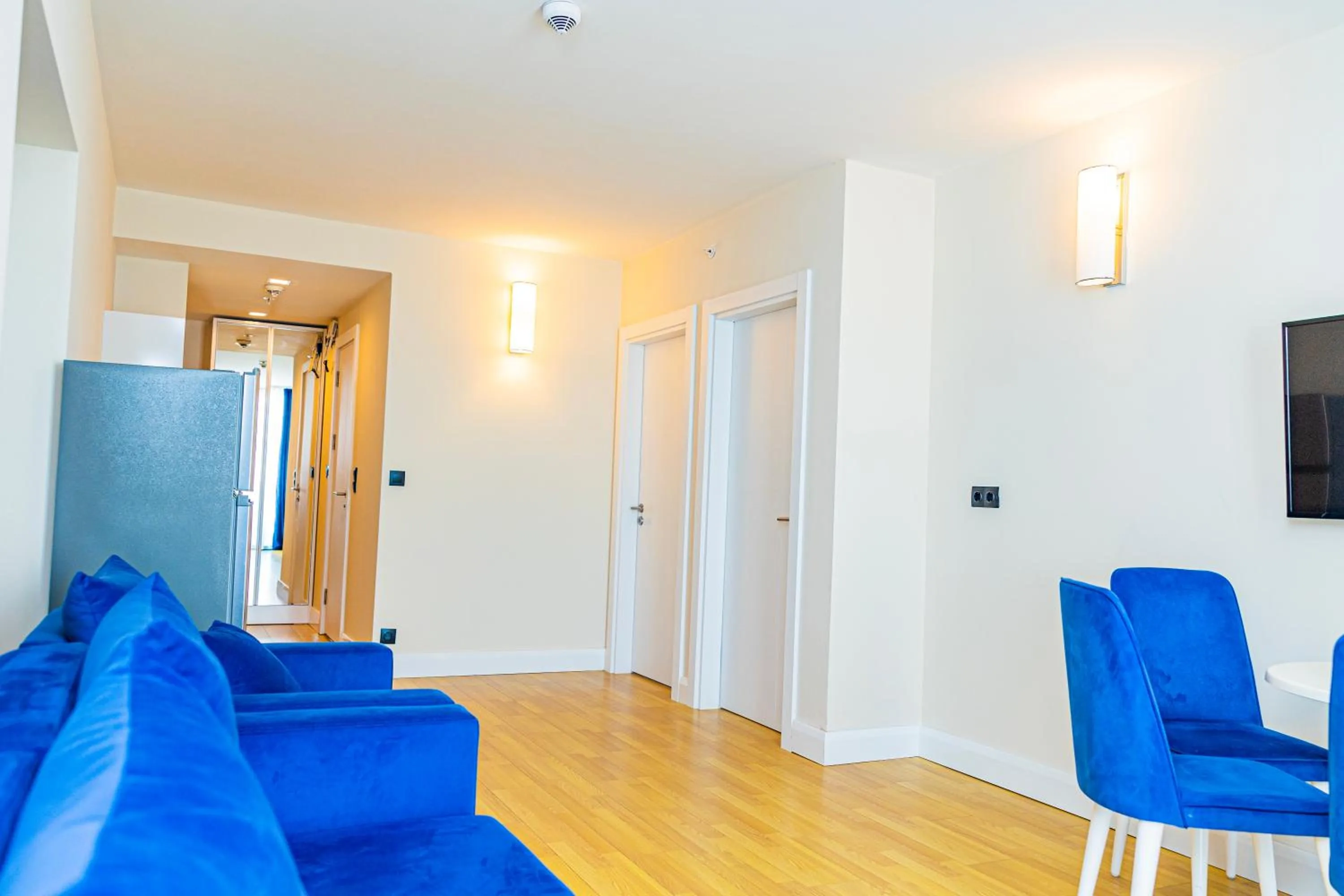 Communal lounge/ TV room, Seating Area in Orbi City Inn