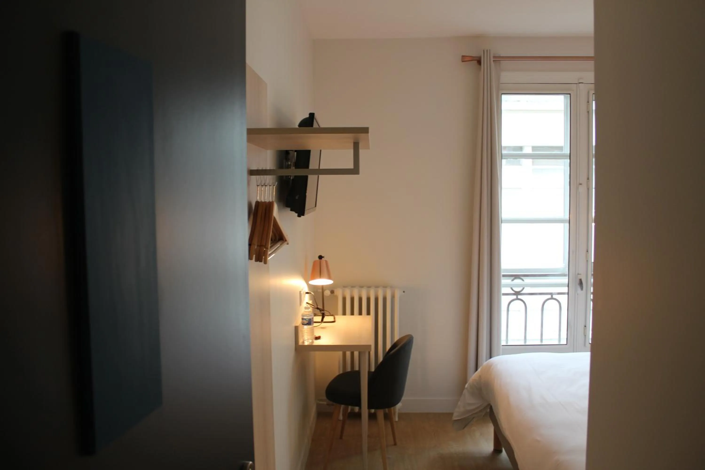 Photo of the whole room in Hôtel La Fontaine Caen Centre