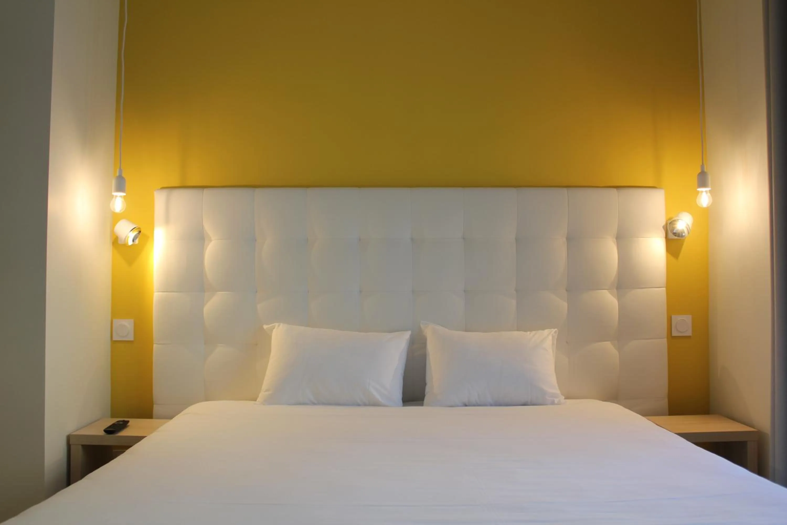 Photo of the whole room, Bed in Hôtel La Fontaine Caen Centre