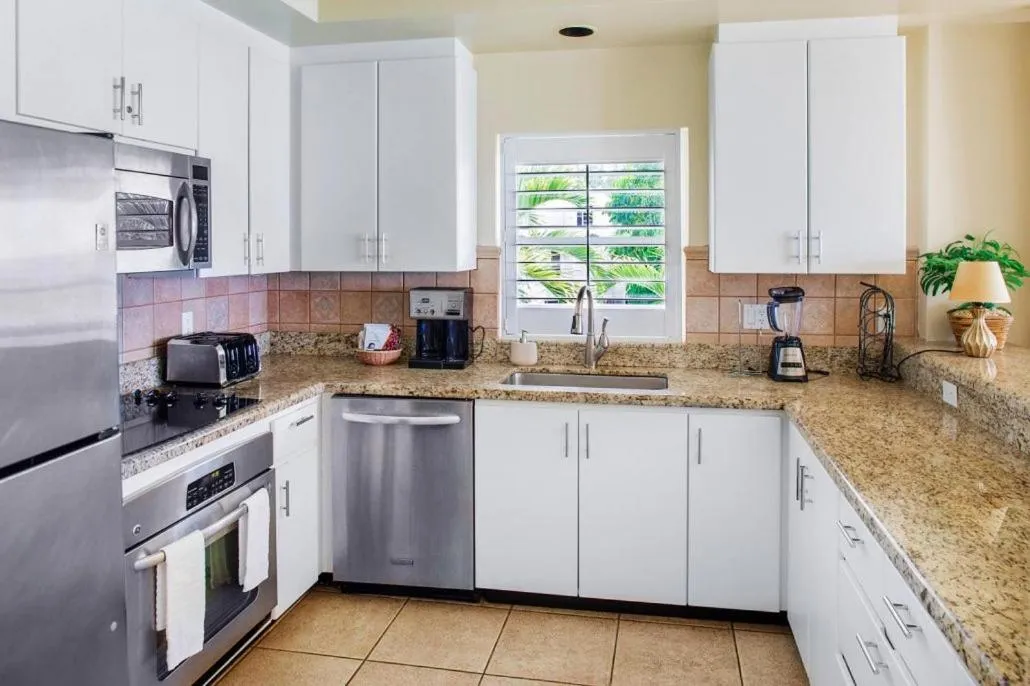 Kitchen or kitchenette in Coral Gardens on Grace Bay