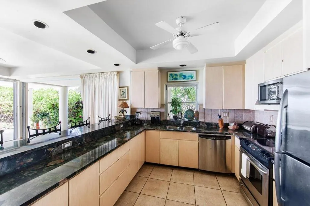 Kitchen or kitchenette in Coral Gardens on Grace Bay