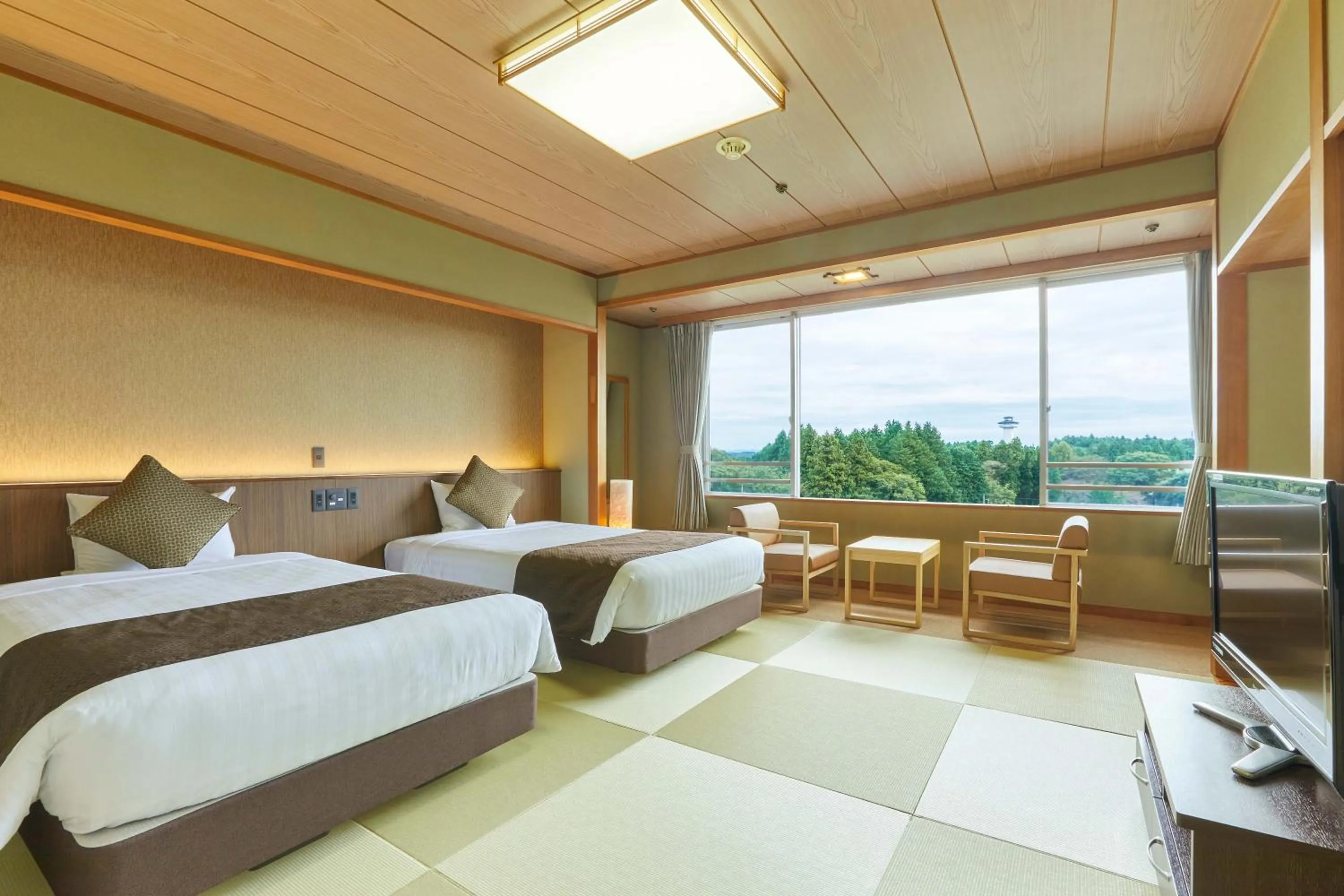 Photo of the whole room, Bed in KAMENOI HOTEL Kitsuregawa
