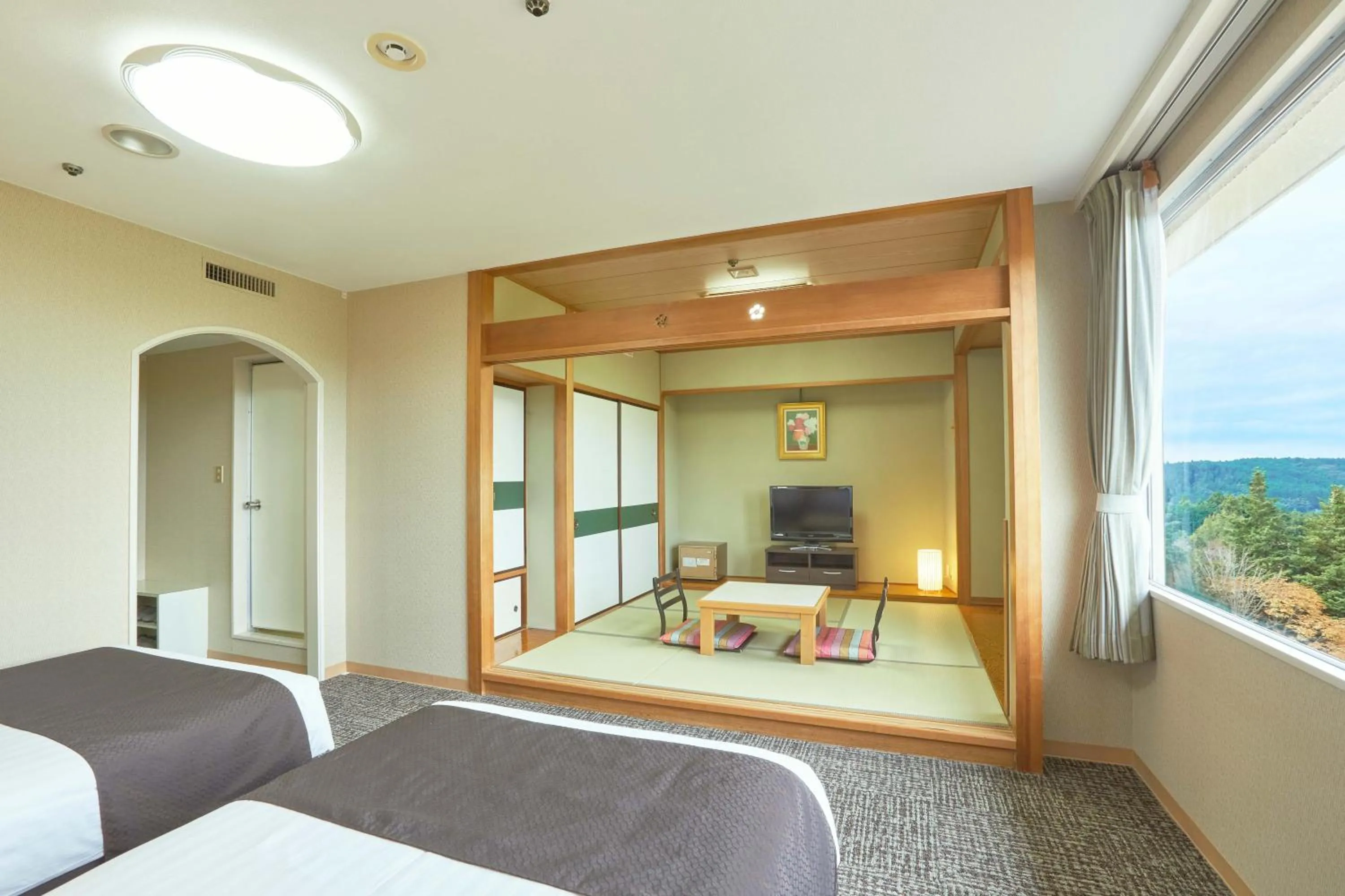 Photo of the whole room, Bed in KAMENOI HOTEL Kitsuregawa