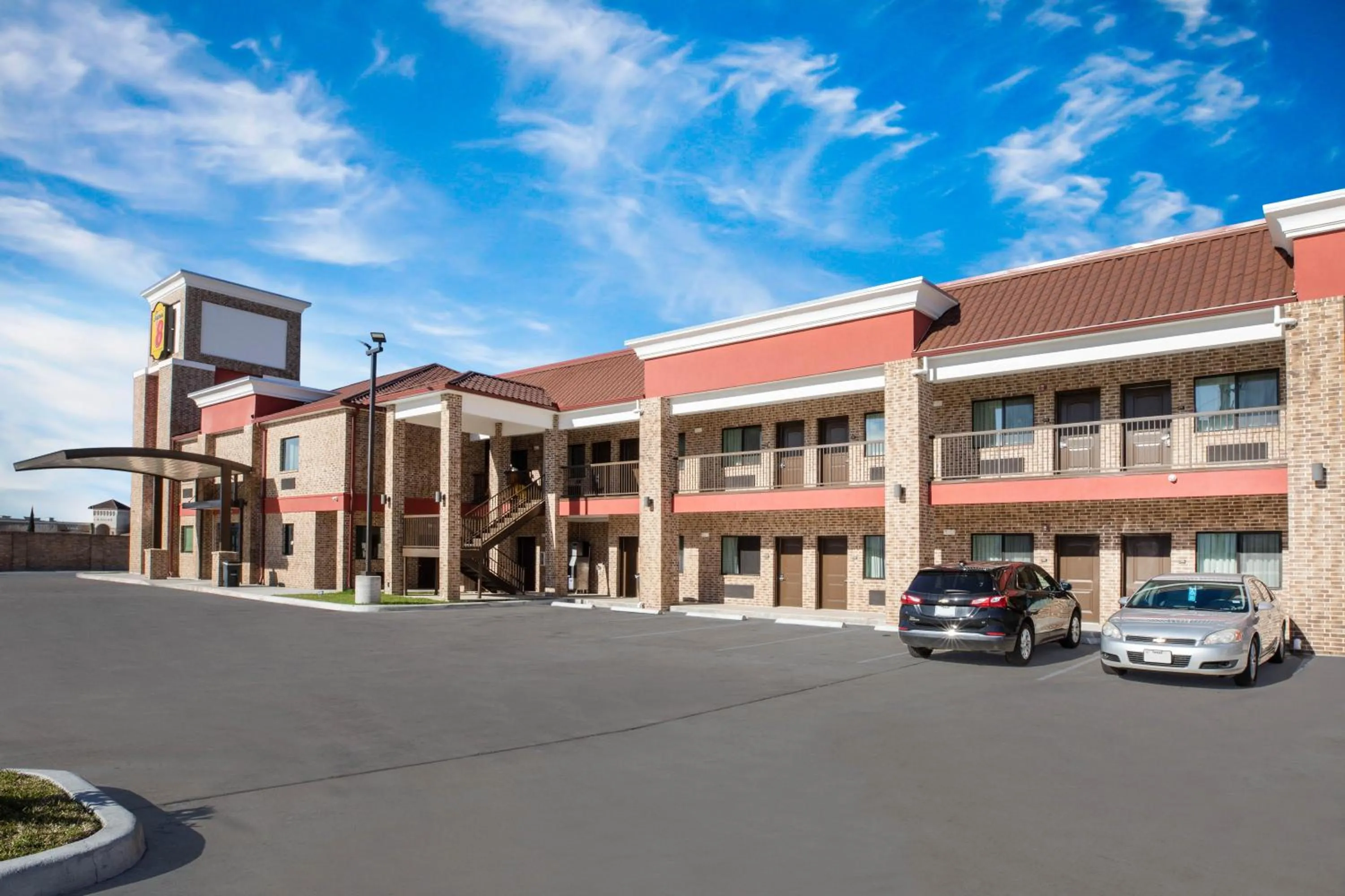 Property building in Super 8 by Wyndham Humble Houston Fallcreek