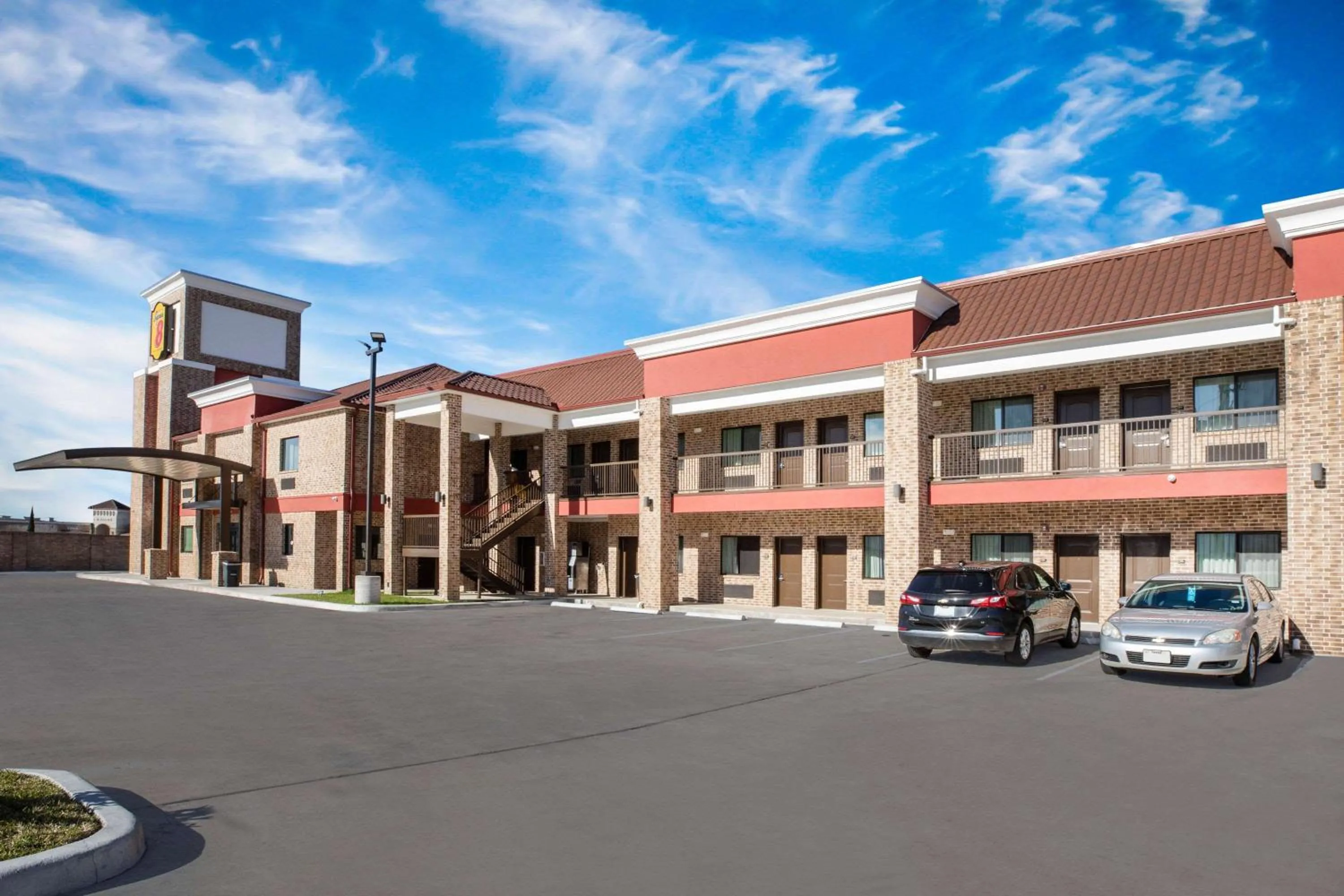 Property building in Super 8 by Wyndham Humble Houston Fallcreek