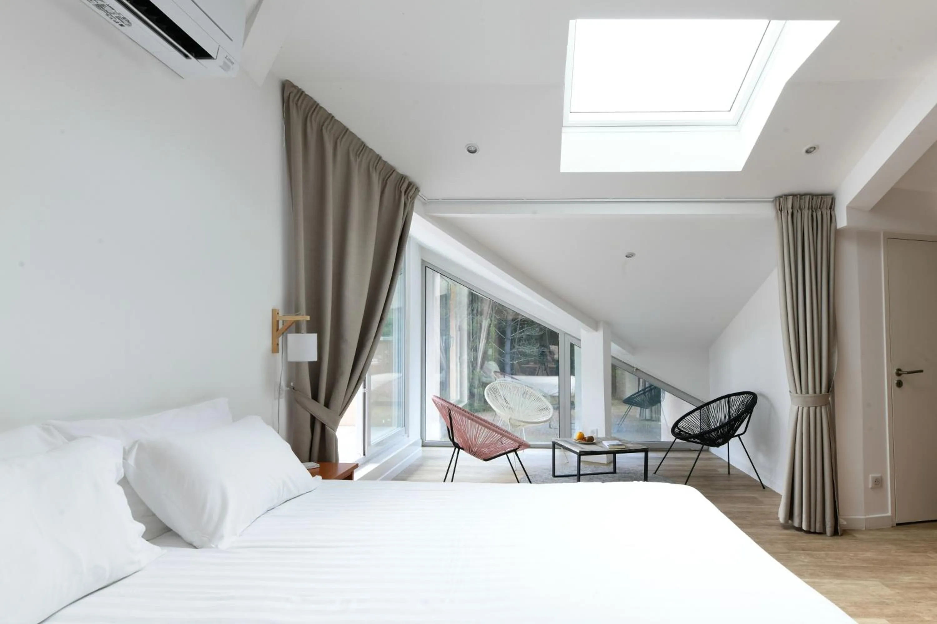 Bed in Hotel Logis Lacotel