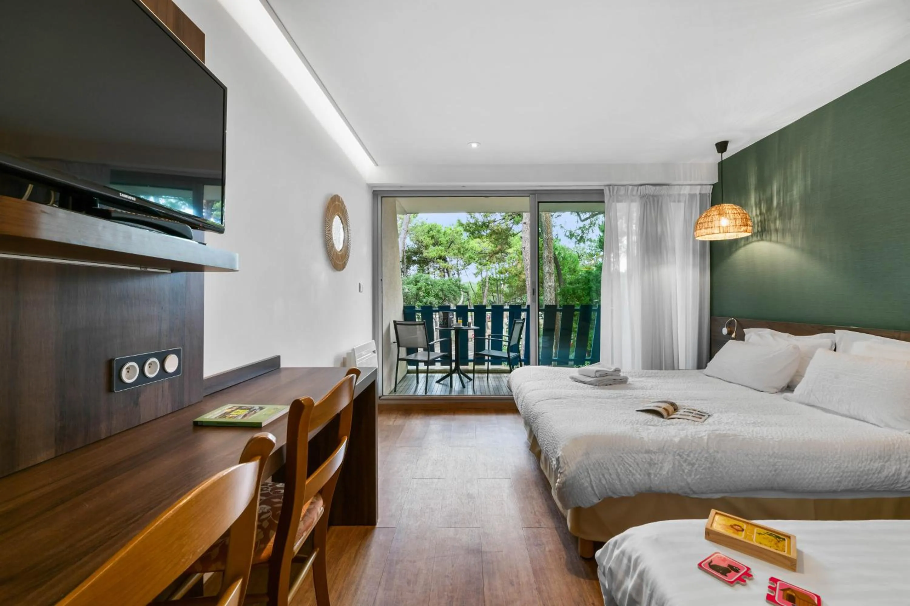 Bed in Hotel Logis Lacotel