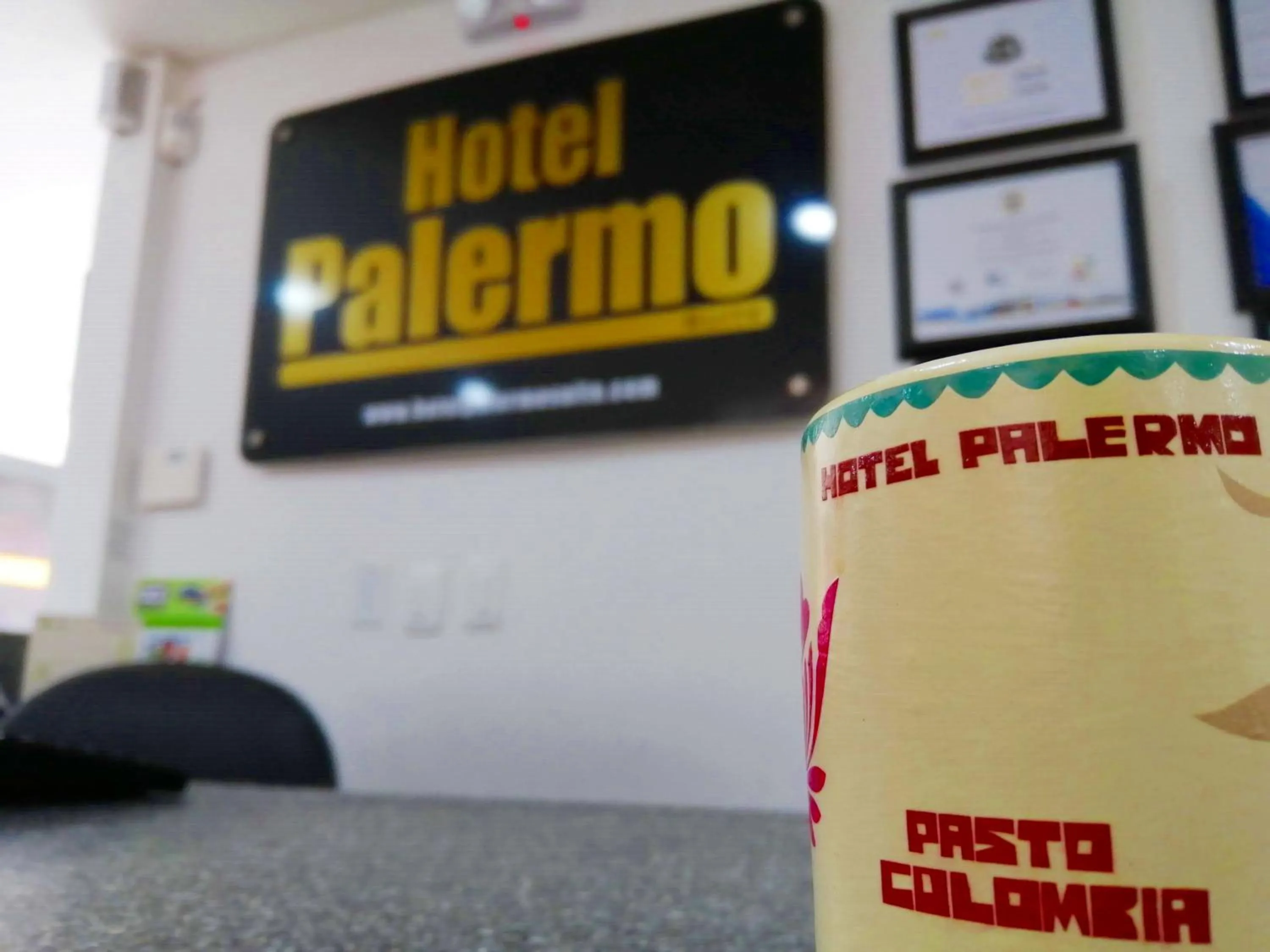 Property logo or sign in Hotel Palermo Suite