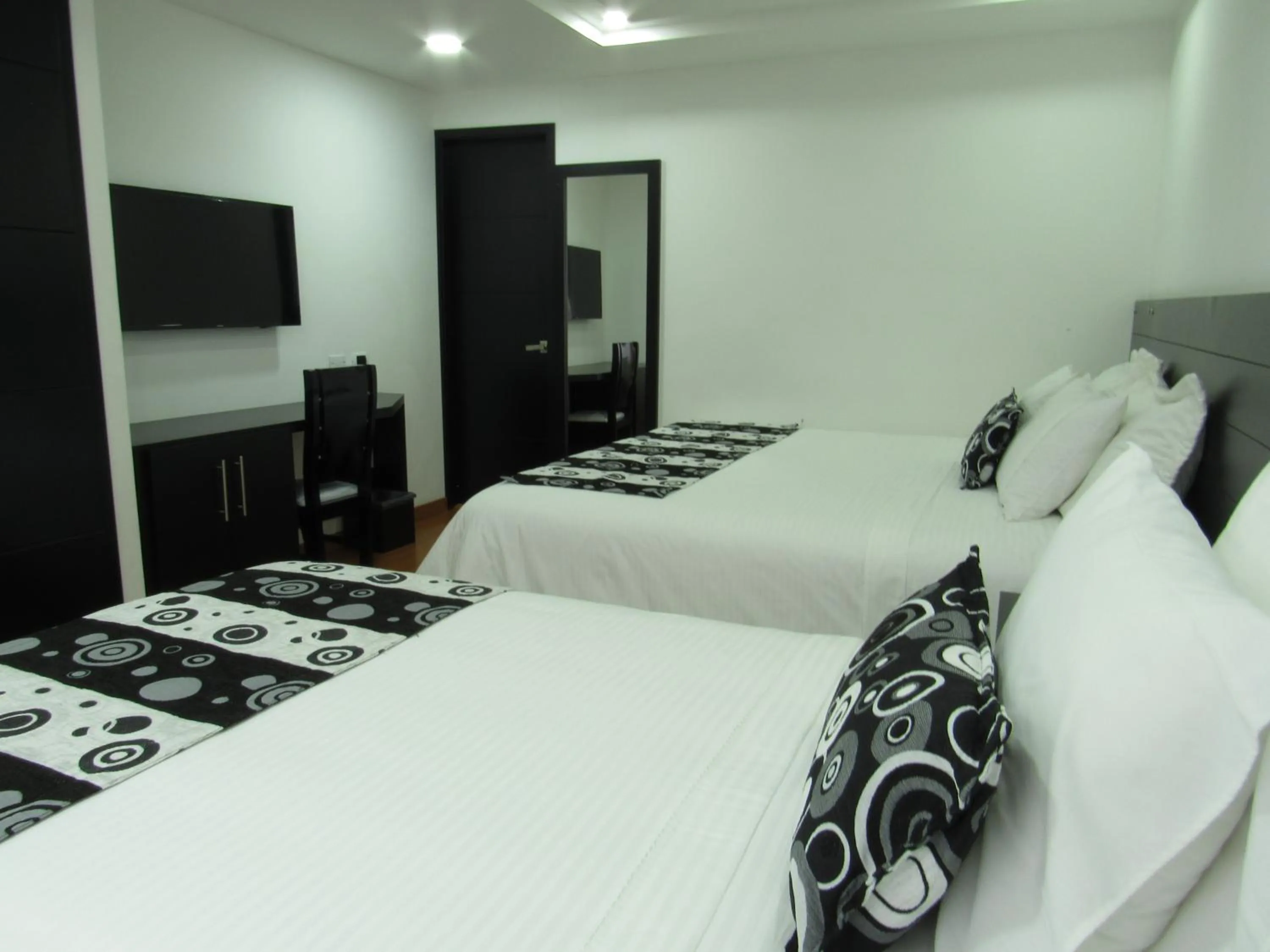 Bed in Hotel Palermo Suite