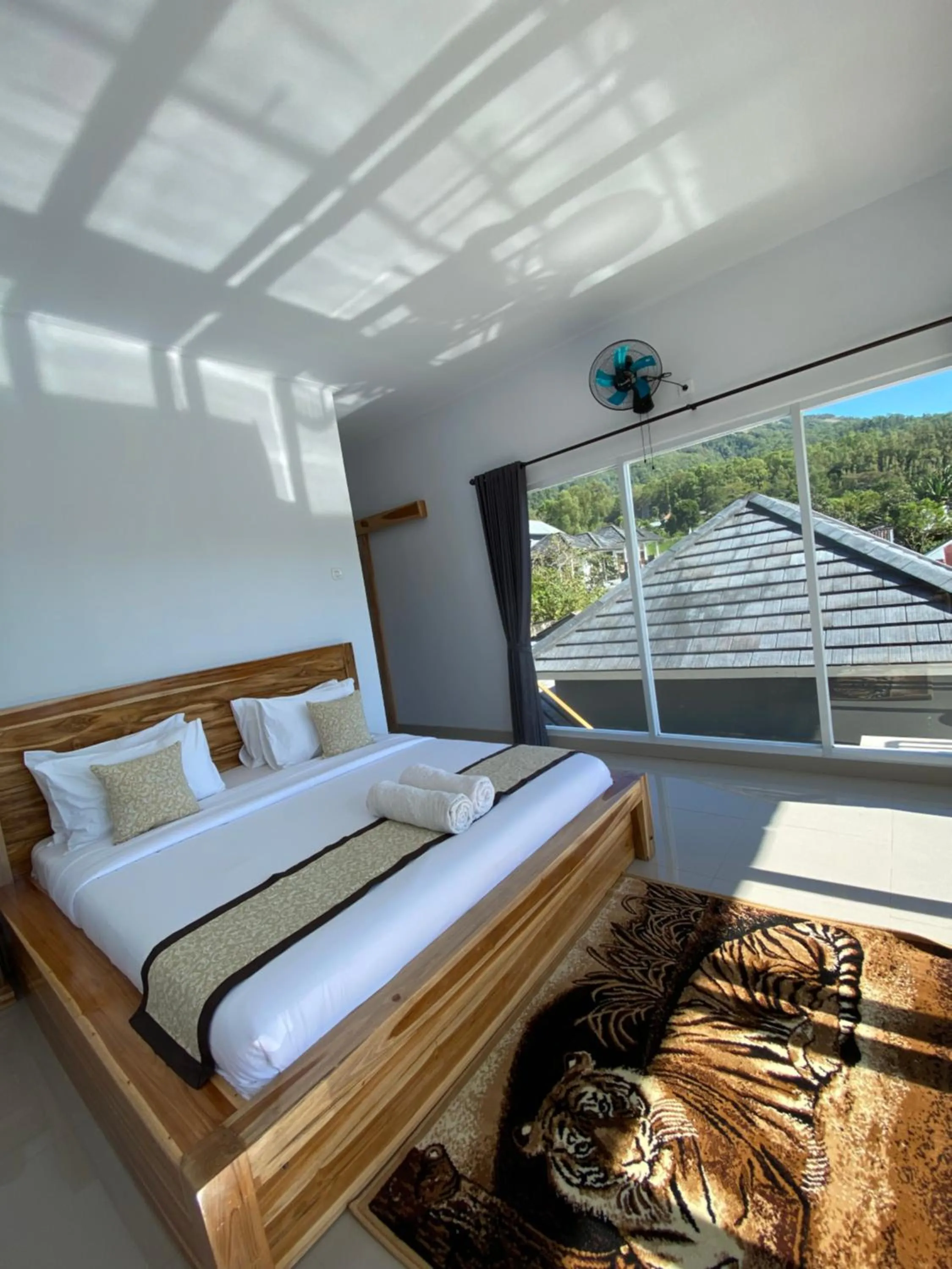 Bed in Batur Pyramid Guesthouse