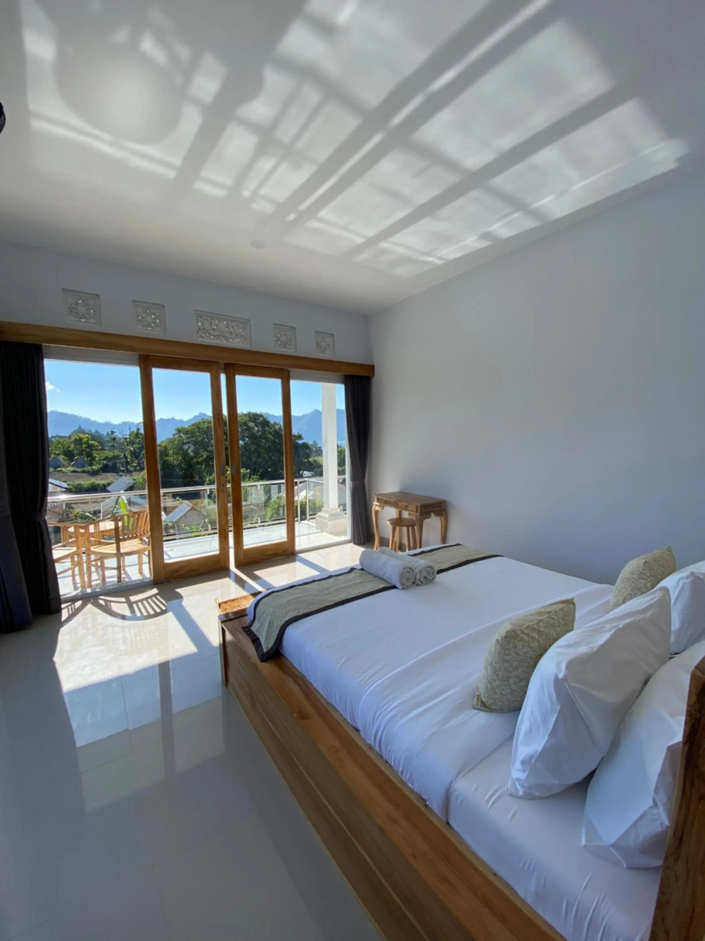 Bed in Batur Pyramid Guesthouse