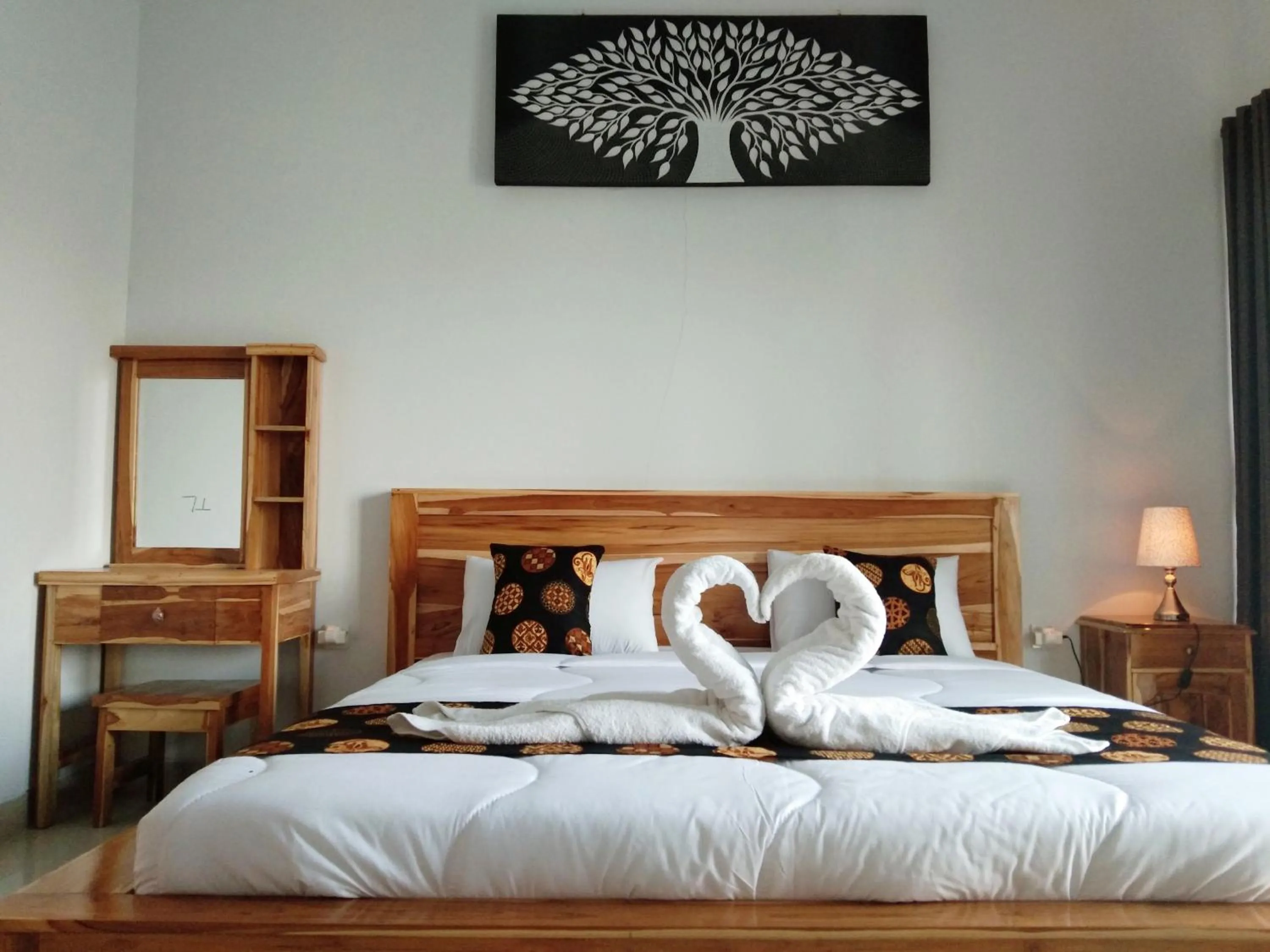 Bed in Batur Pyramid Guesthouse
