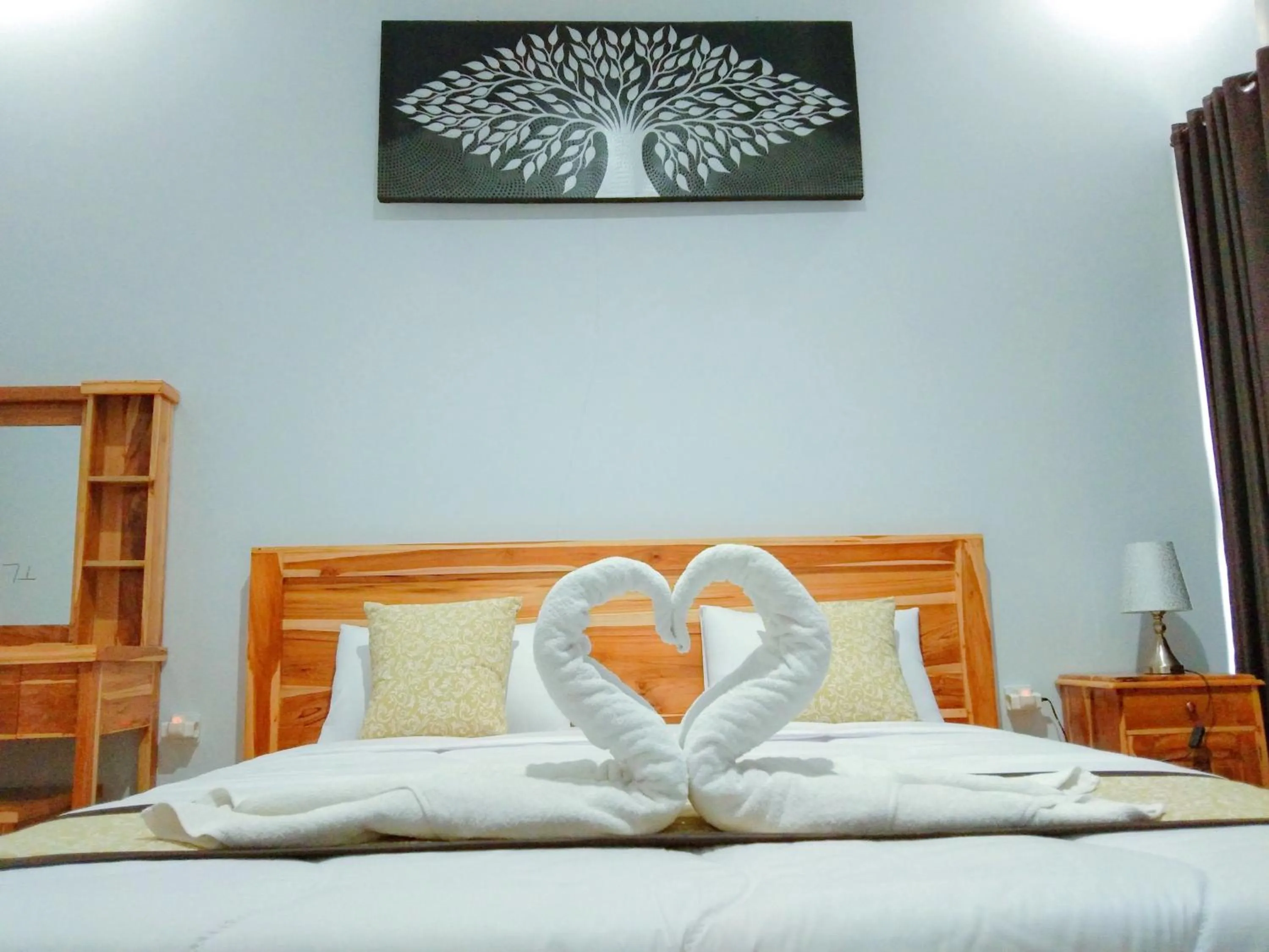 Bed in Batur Pyramid Guesthouse