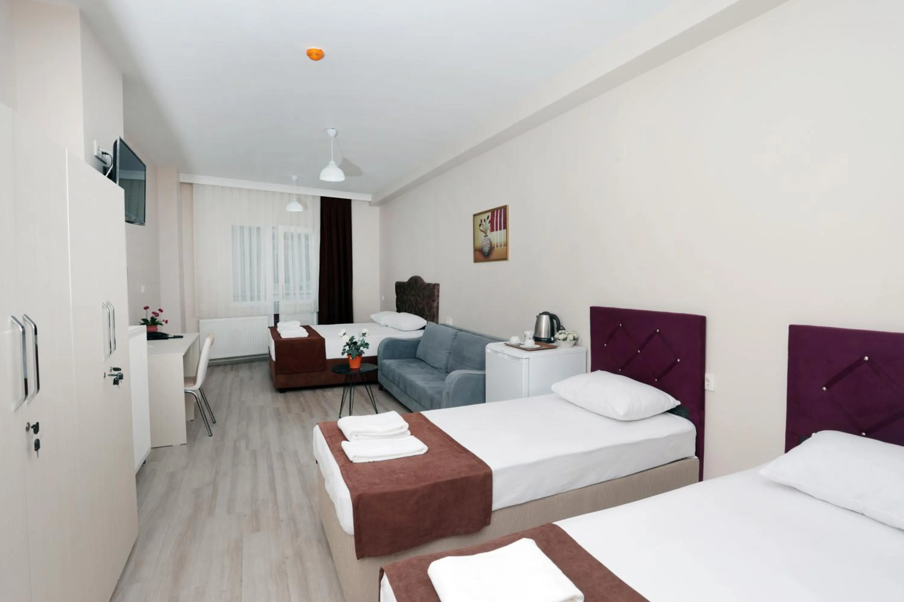 Bed in BEKSİTİ HOTEL