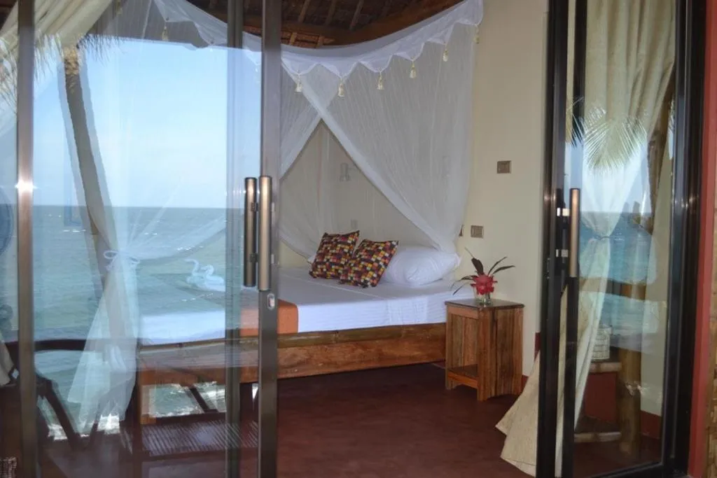 Bed in Camiguin Volcan Beach Eco Retreat & Dive Resort