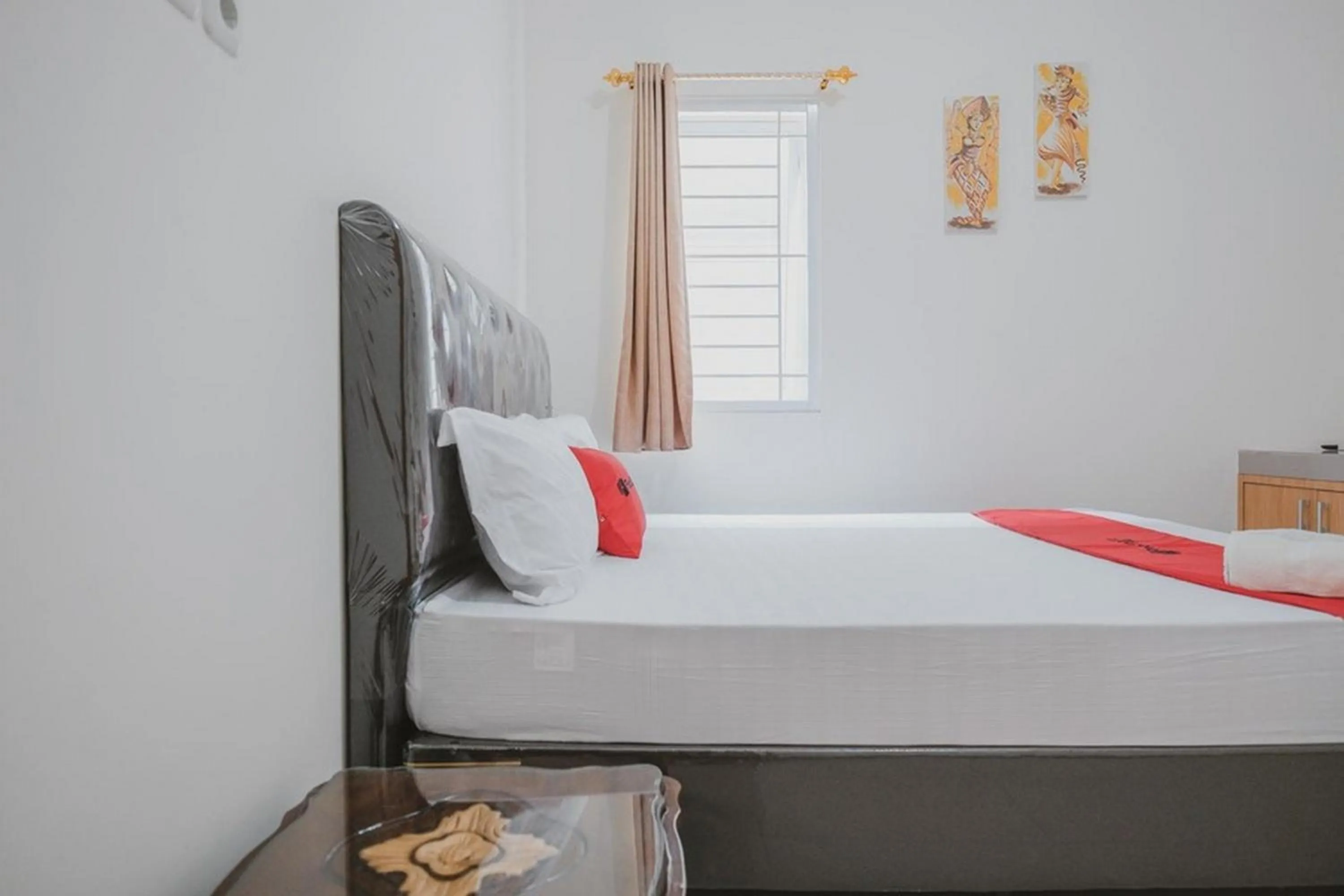 Bed in RedDoorz Syariah near Pahoman Lampung