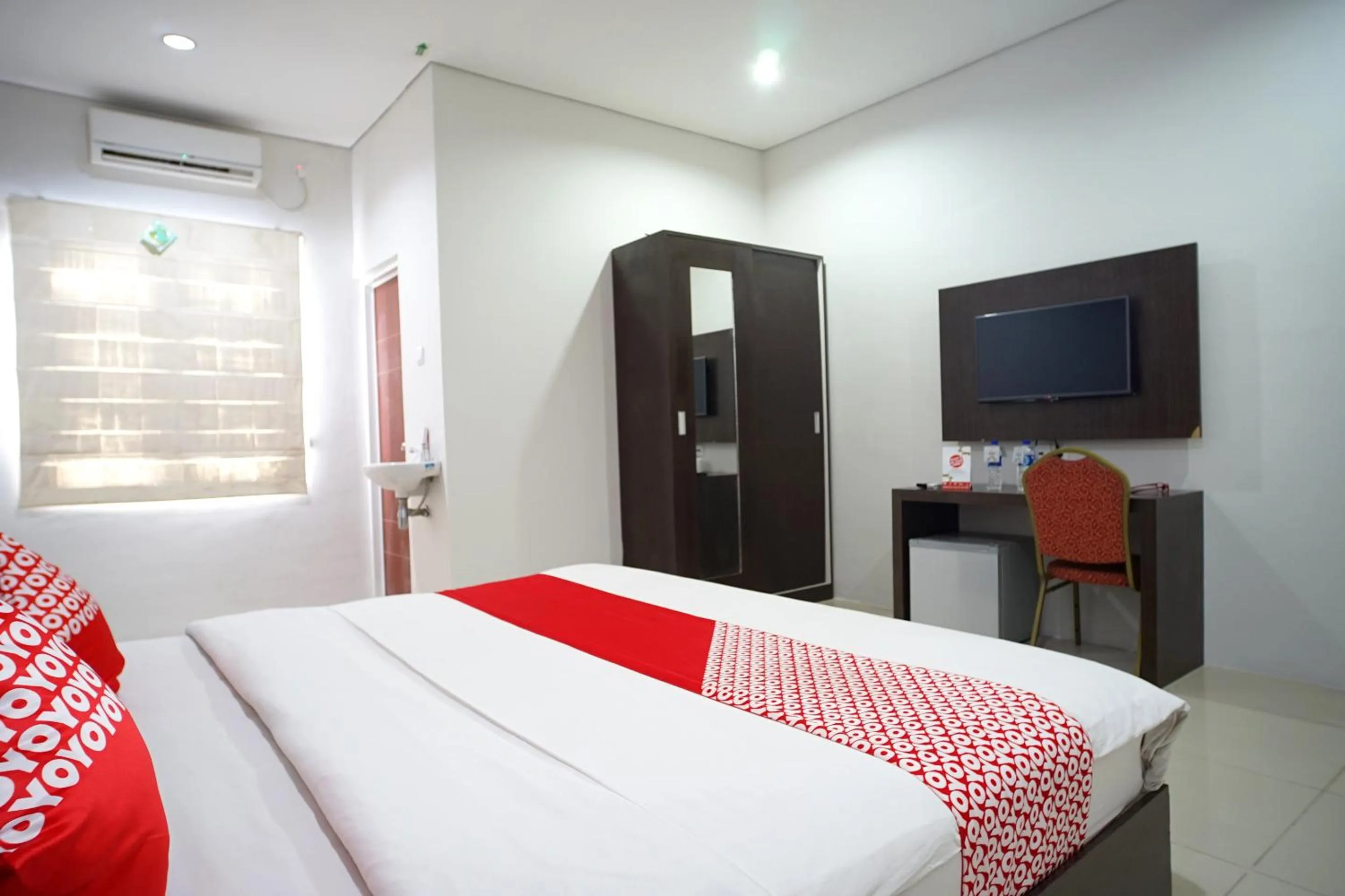 TV and multimedia, Bed in OYO 1477 Athar 88 Hotel
