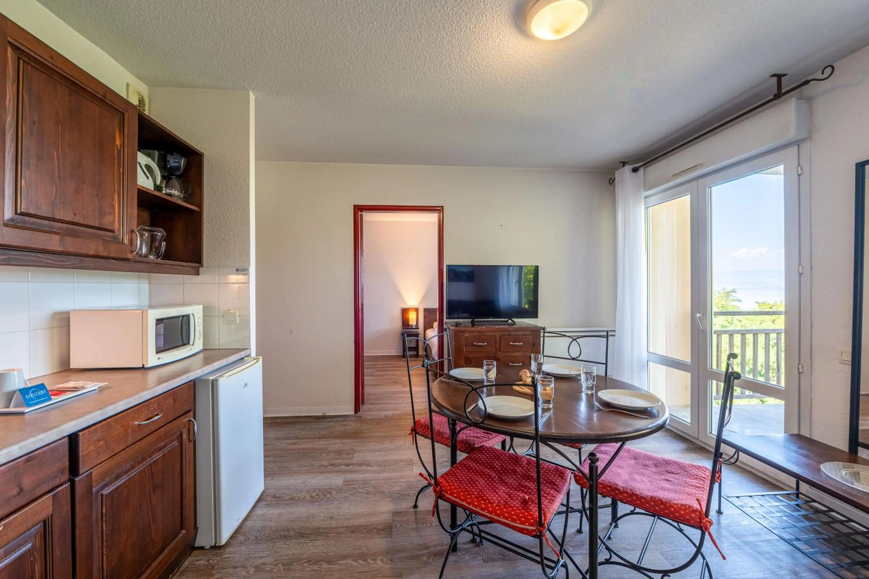 Kitchen or kitchenette in Zenitude Evian Les Terrasses du Lac, an Ascend Collection Hotel