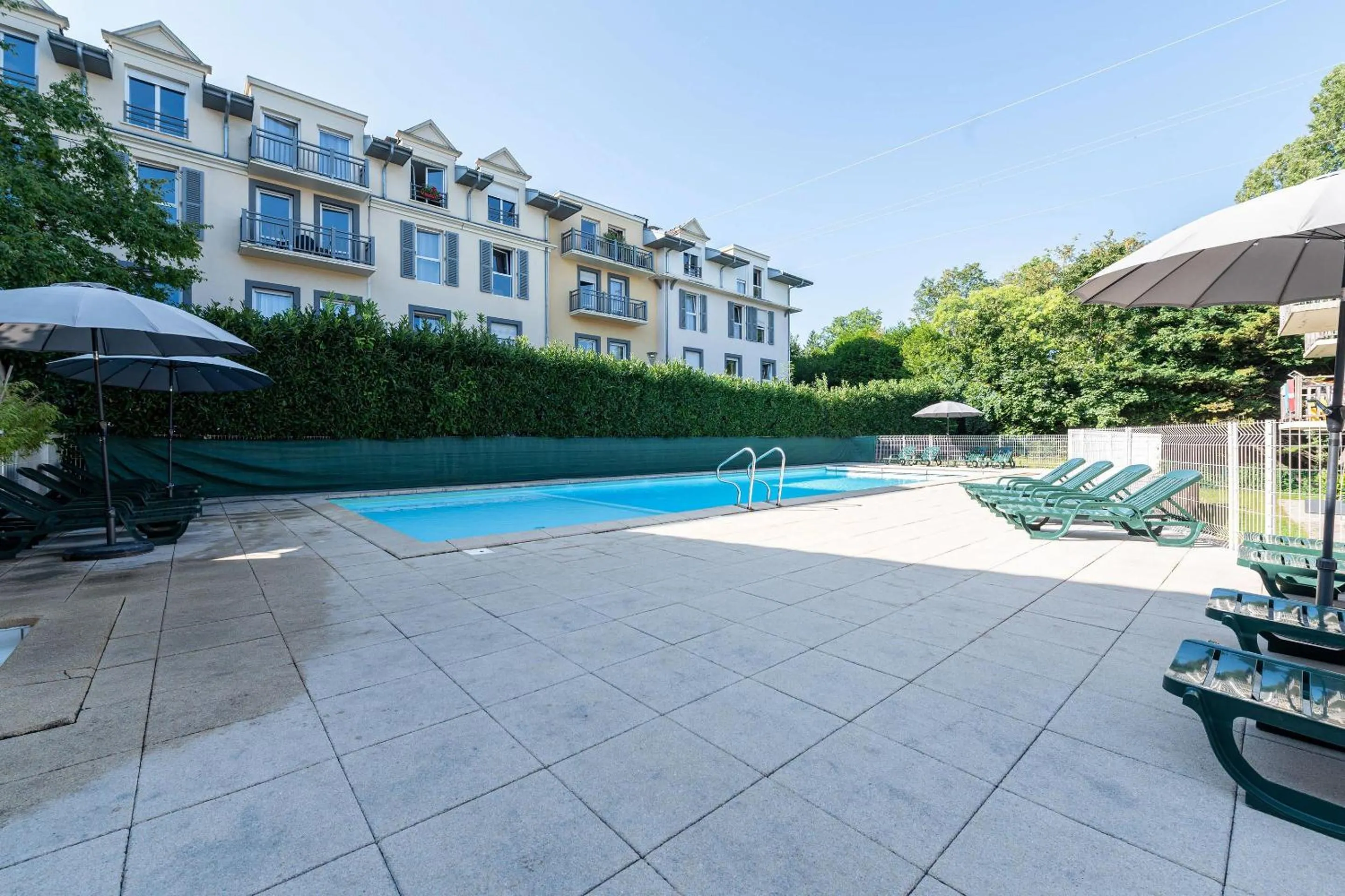 Swimming pool in Zenitude Evian Les Terrasses du Lac, an Ascend Collection Hotel