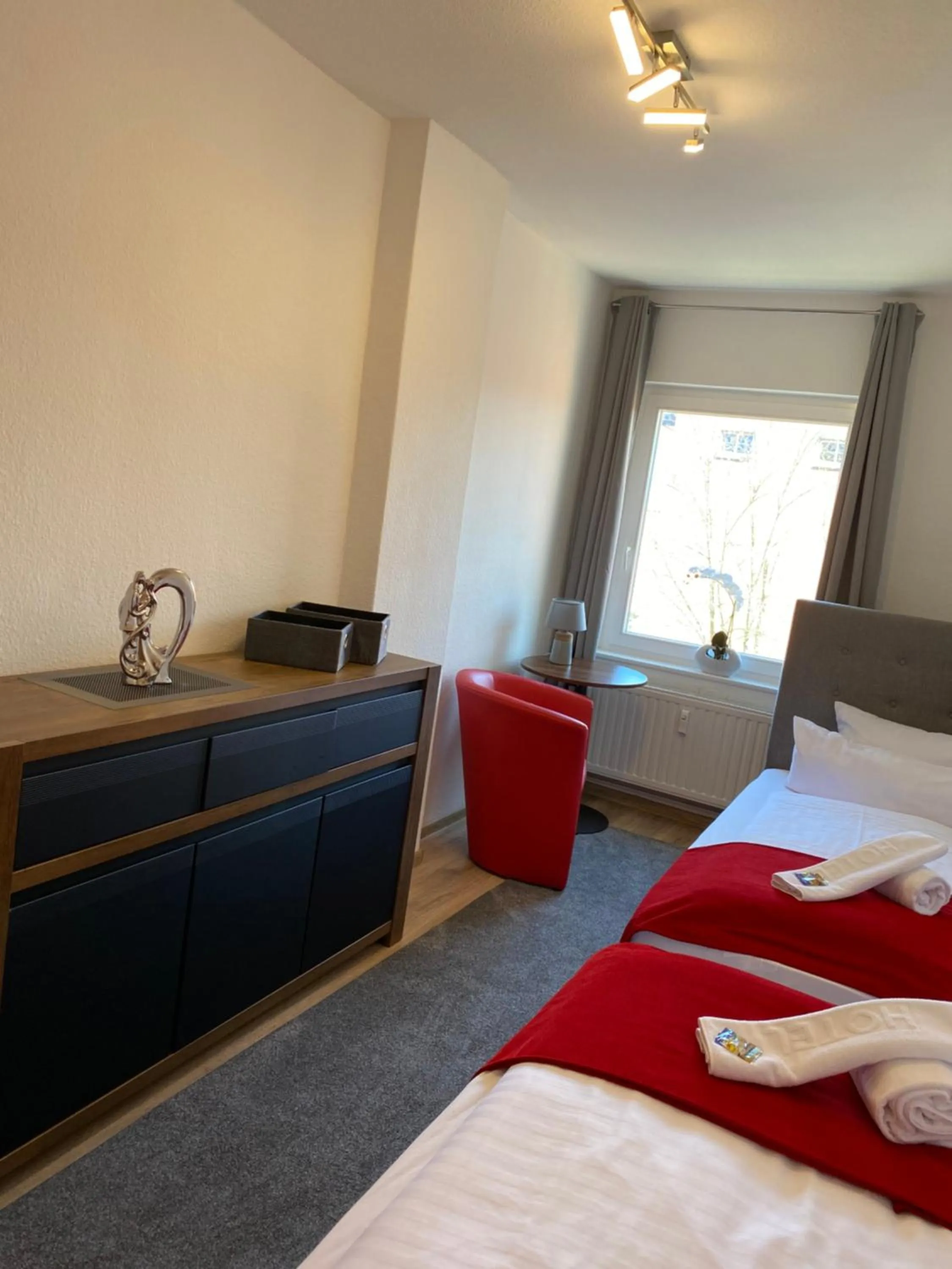 Bed in Viadrina Rooms & Apartments Frankfurt-Oder am Park im Zentrum