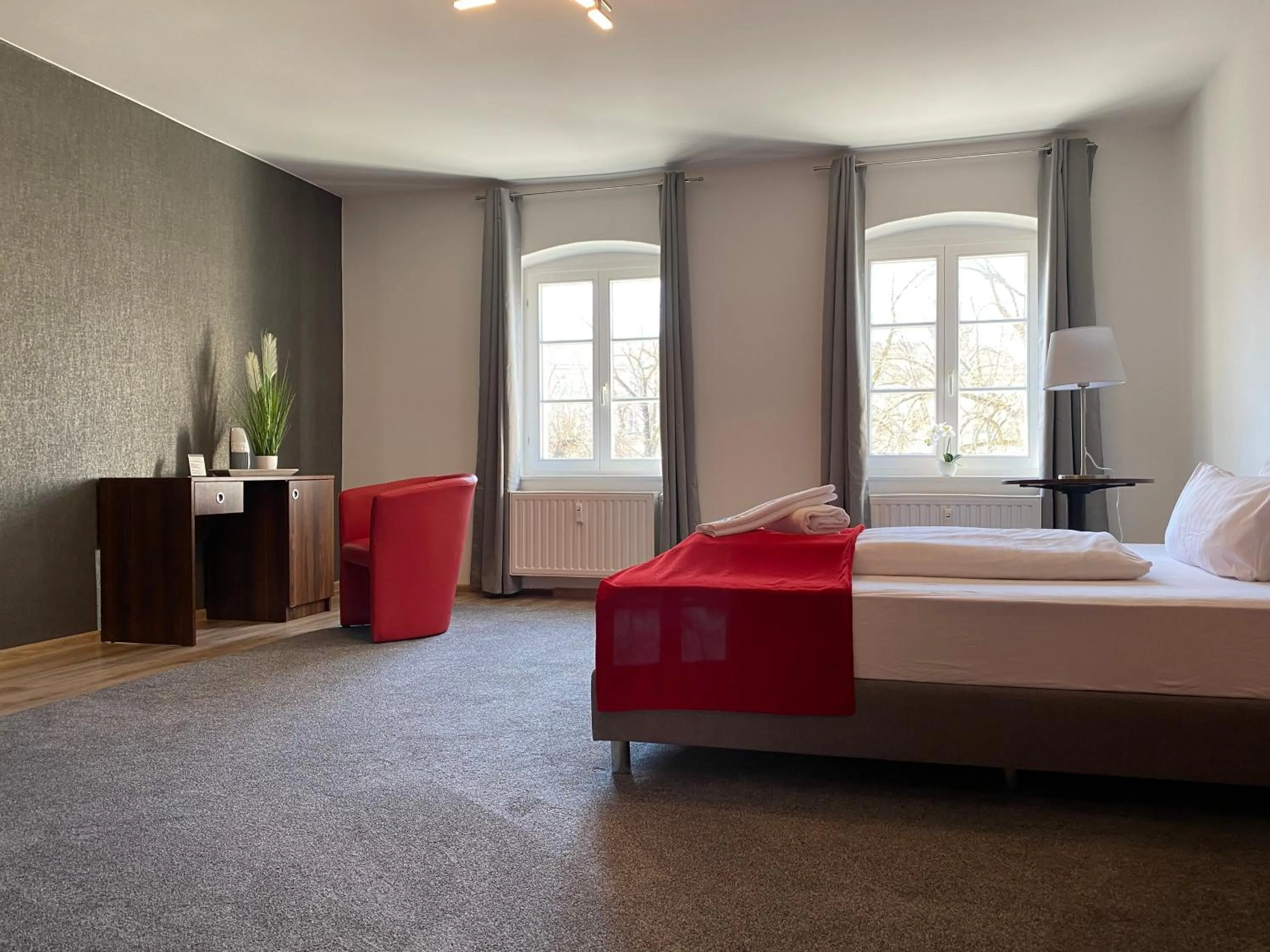Bed in Viadrina Rooms & Apartments Frankfurt-Oder am Park im Zentrum