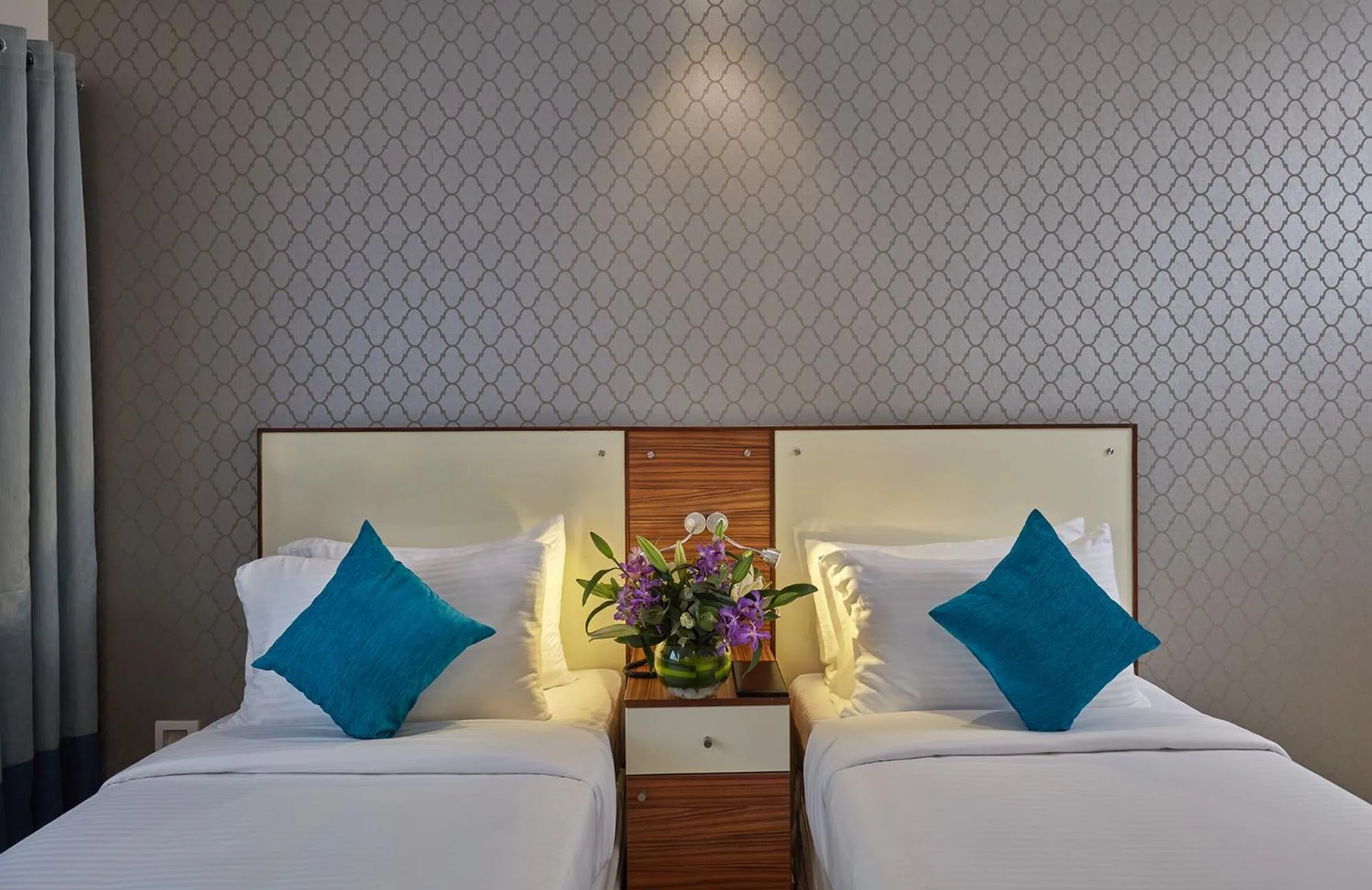 Bedroom, Bed in Regenta Inn Indiranagar by Royal Orchid Hotels
