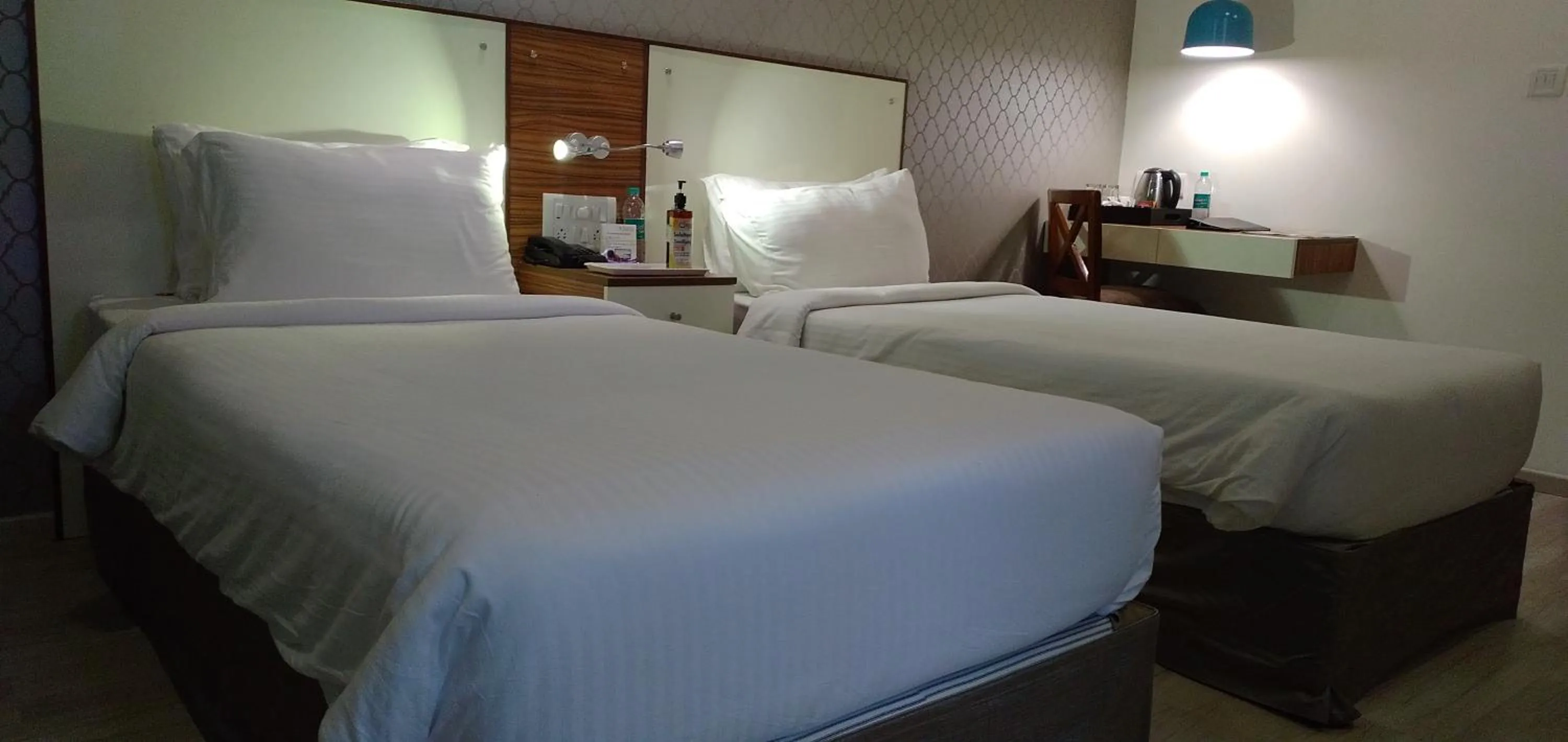 Bed in Regenta Inn Indiranagar by Royal Orchid Hotels