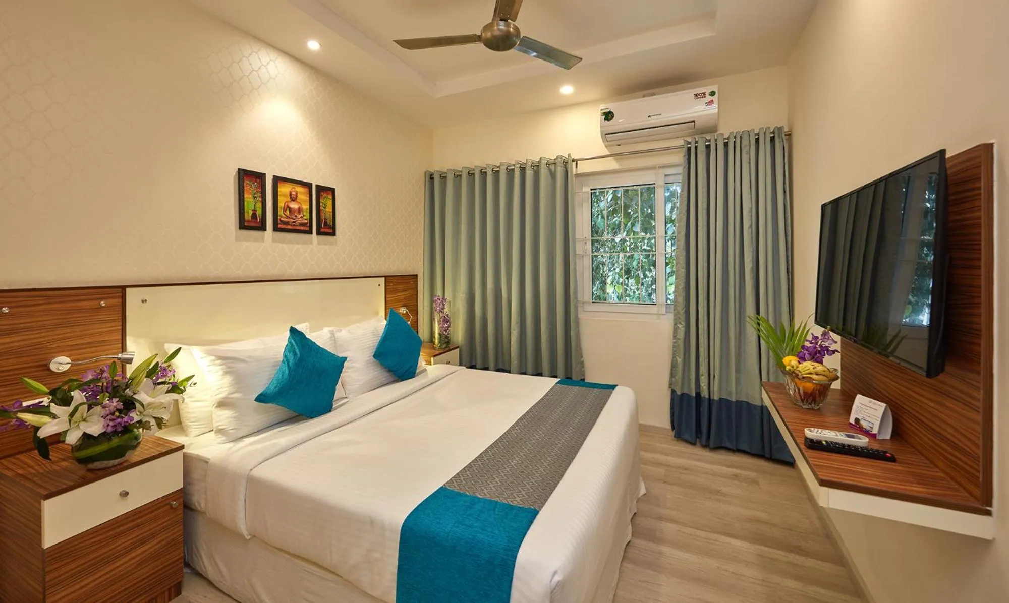 Bedroom, Bed in Regenta Inn Indiranagar by Royal Orchid Hotels