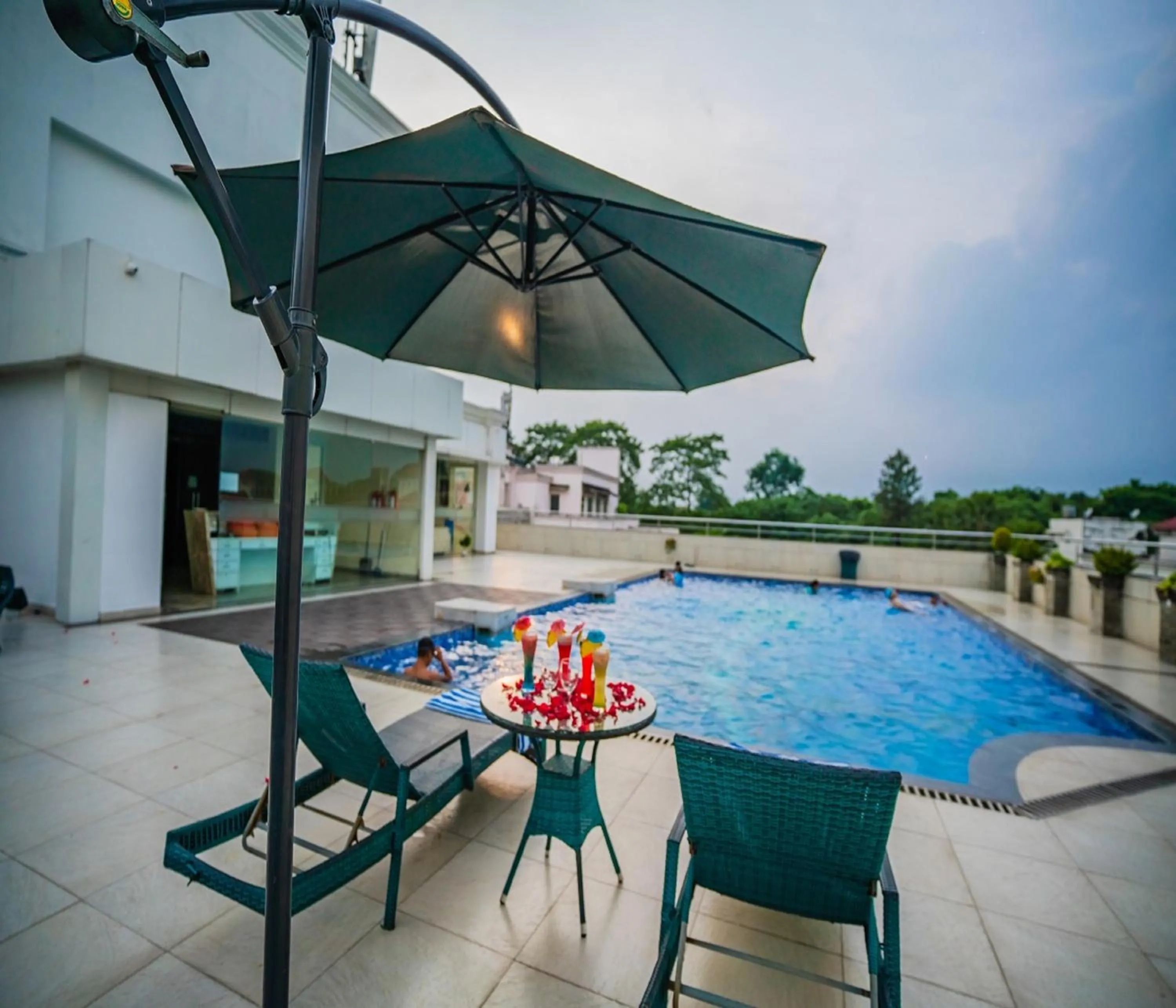 Swimming pool in Barsana Hotel & Resort Siliguri