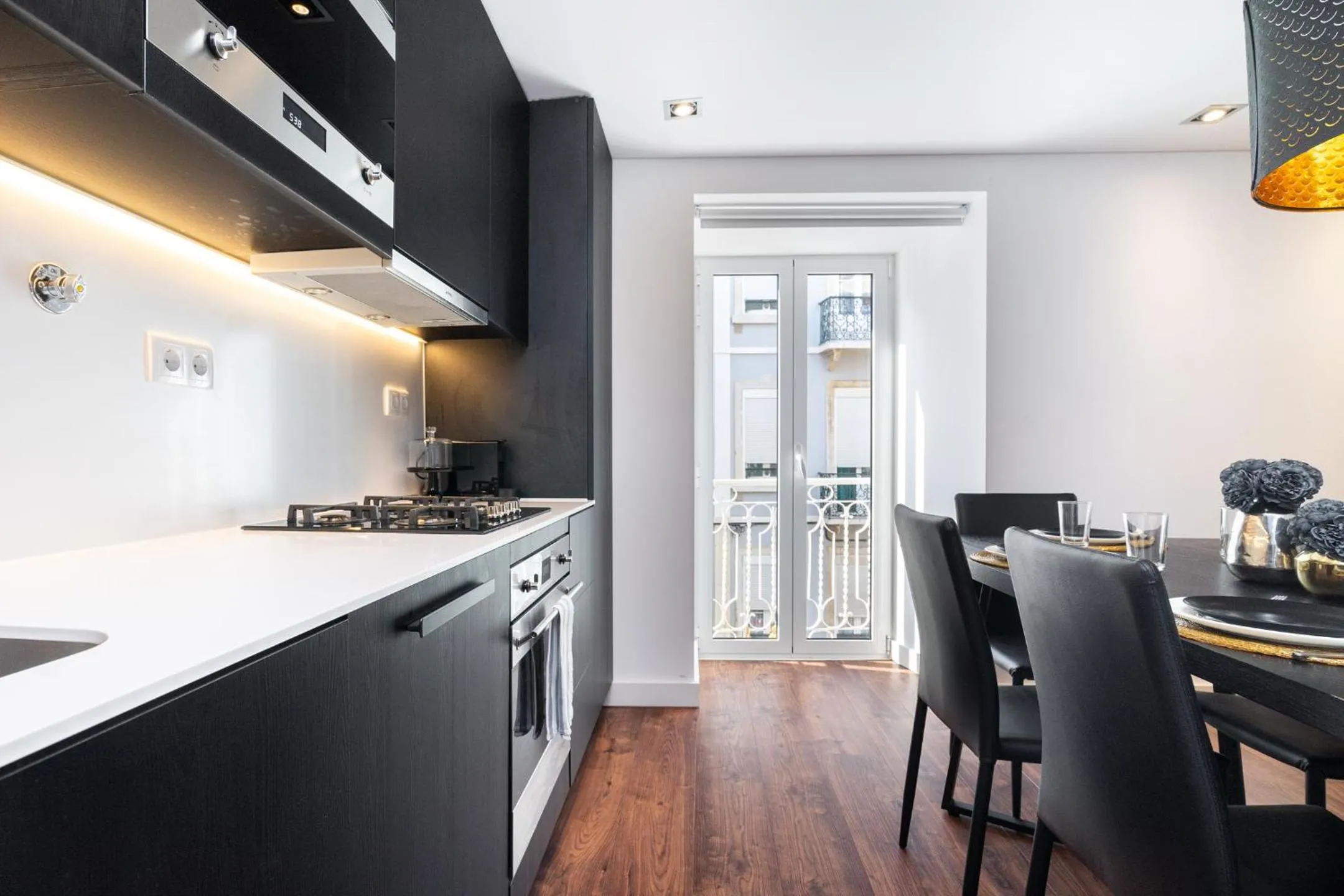 Kitchen or kitchenette in WHome | Graça Family Apartment