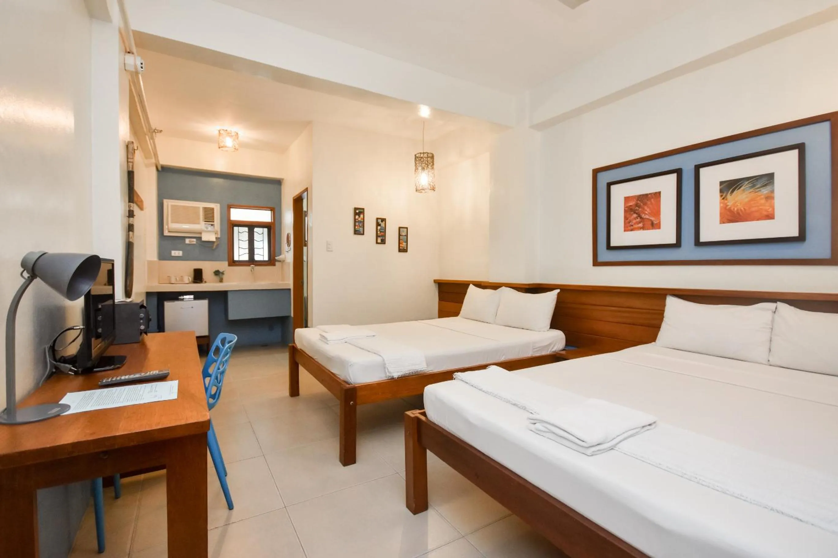 Photo of the whole room, Bed in Agos Boracay Rooms + Beds