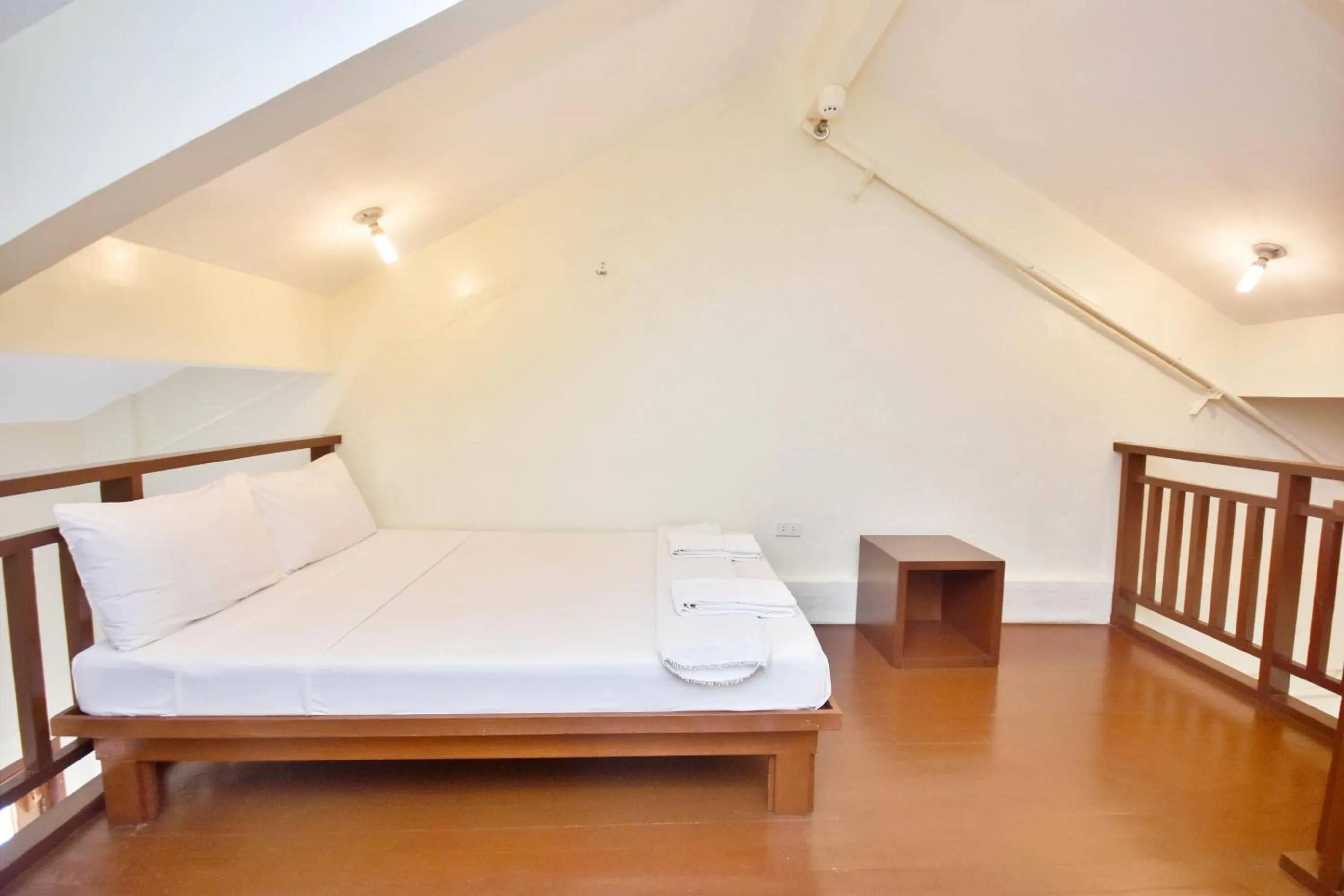 Photo of the whole room, Bed in Agos Boracay Rooms + Beds