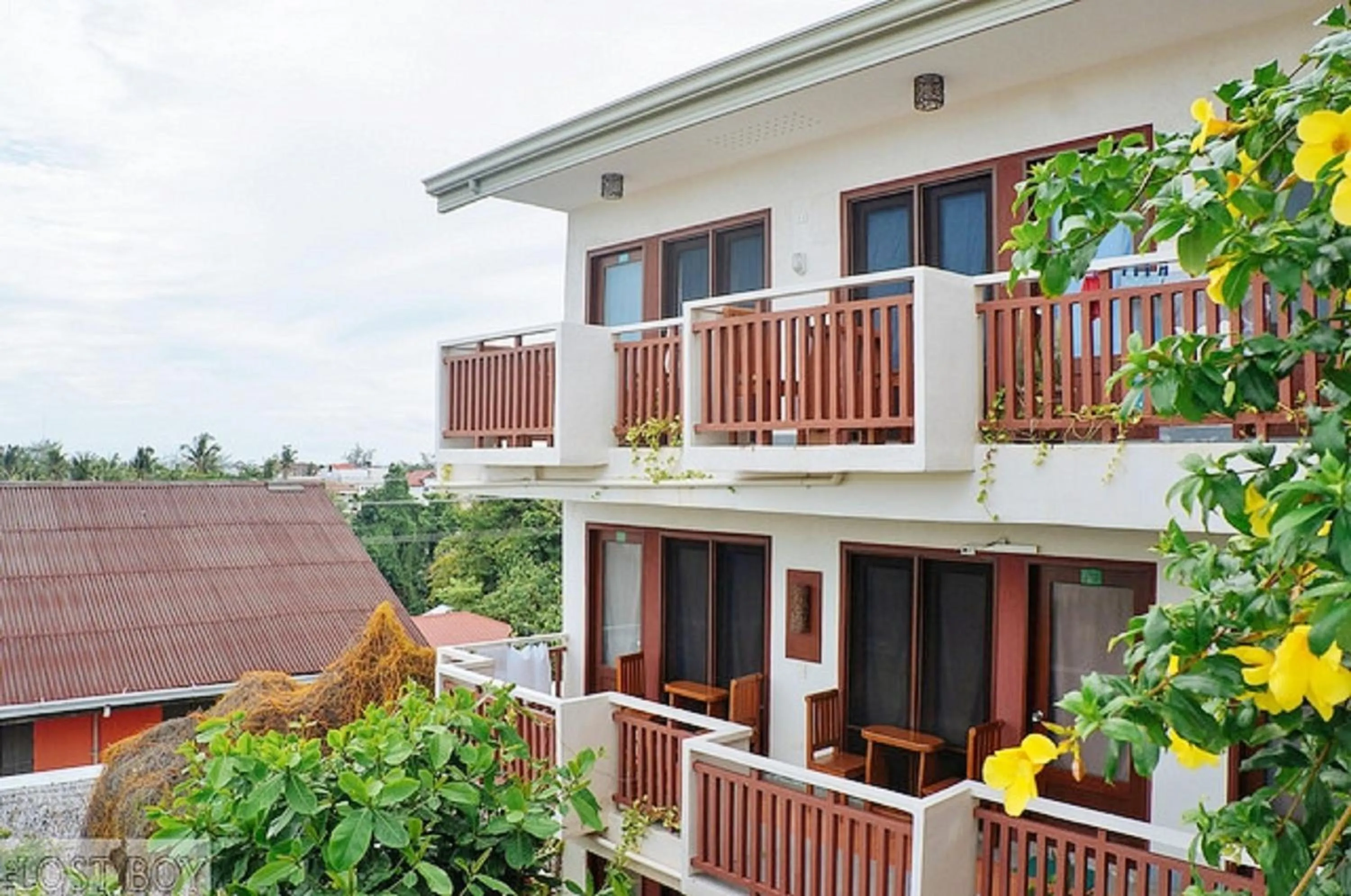 Property building in Agos Boracay Rooms + Beds