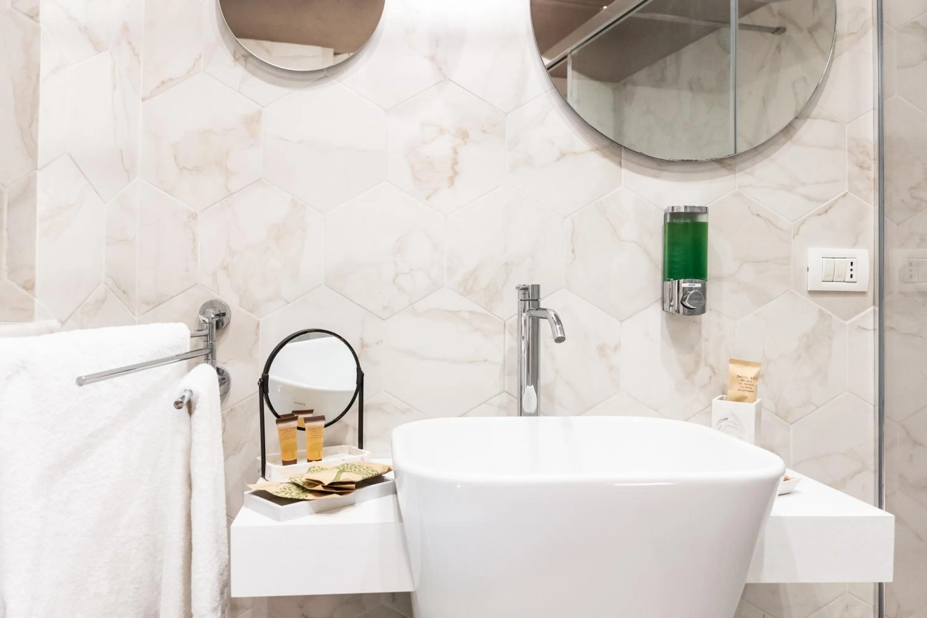 Bathroom in Scene Suites Apartments