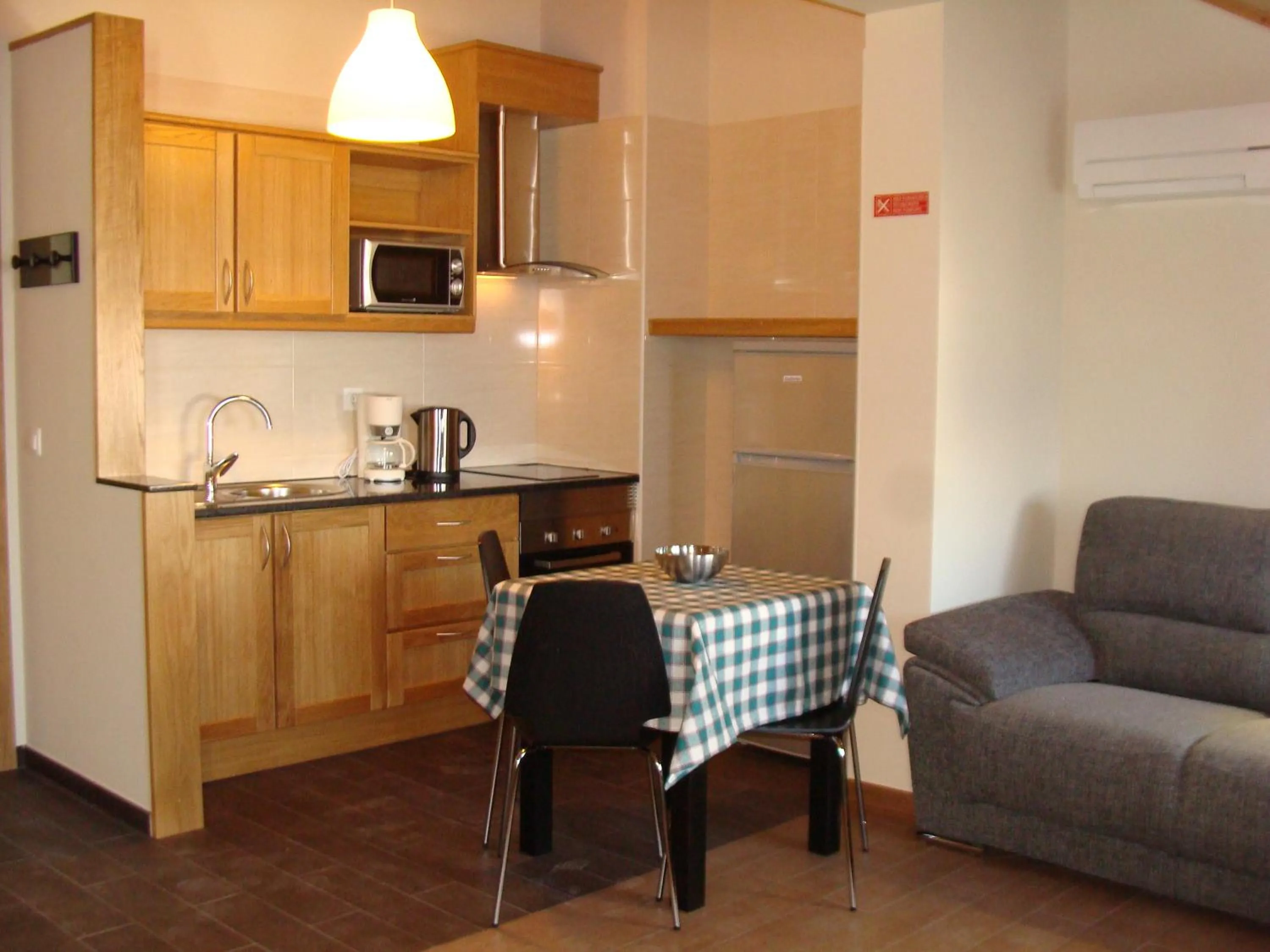 Kitchen or kitchenette in Apartamentos Kósmos