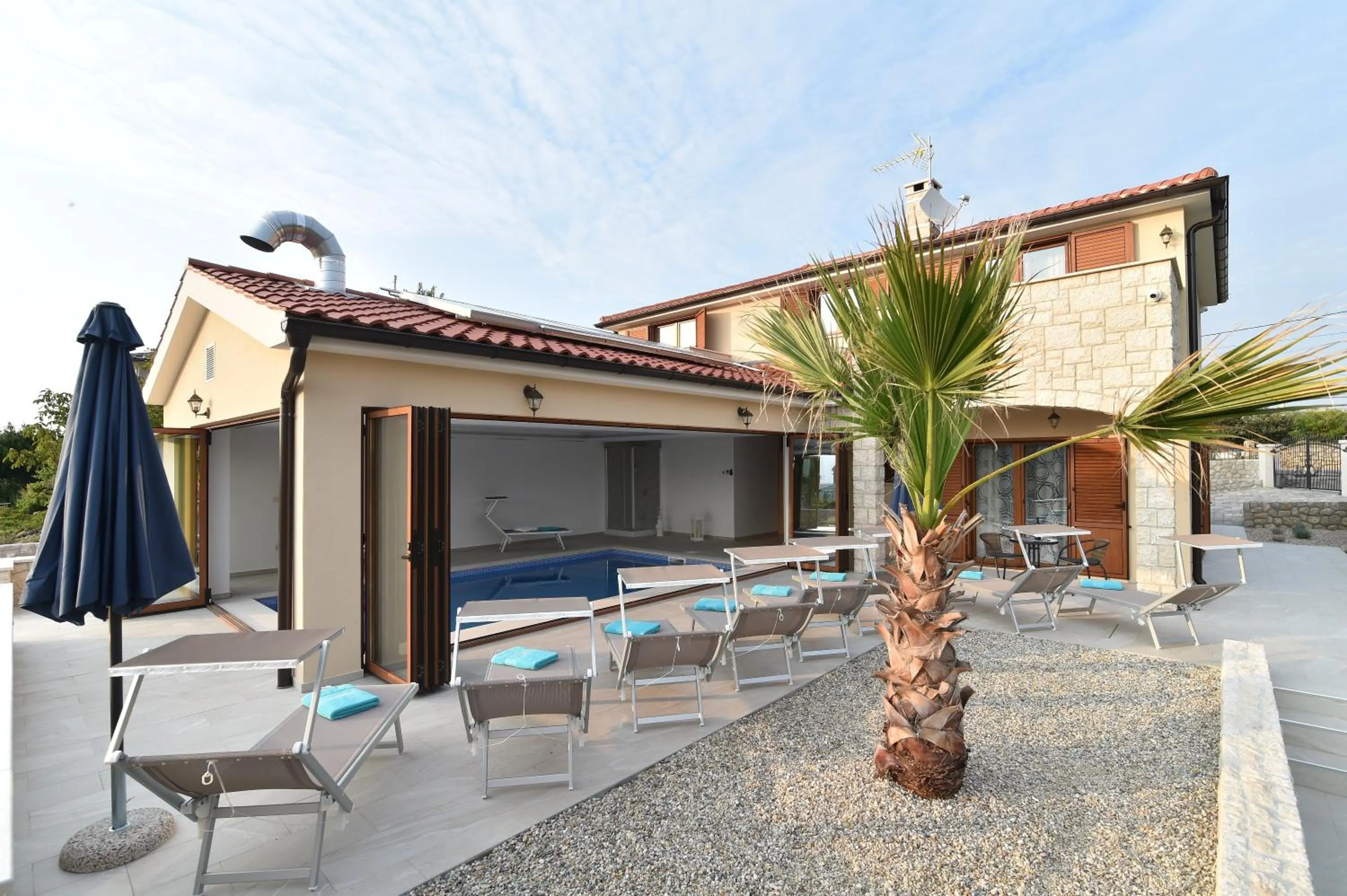 Patio in Villa Muskatel KRK -with heated covered pool