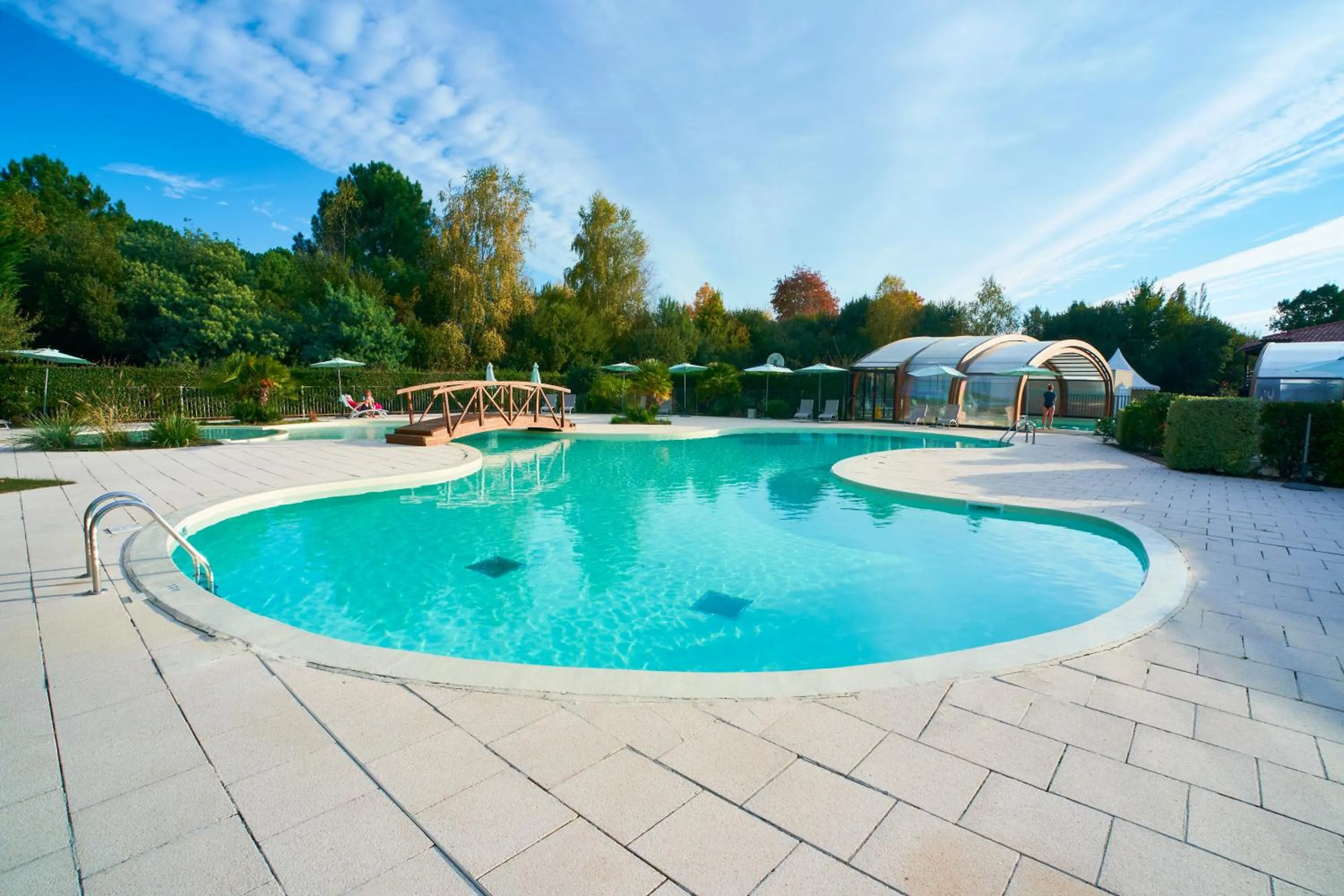 Swimming pool in Les Cottages Du Lac
