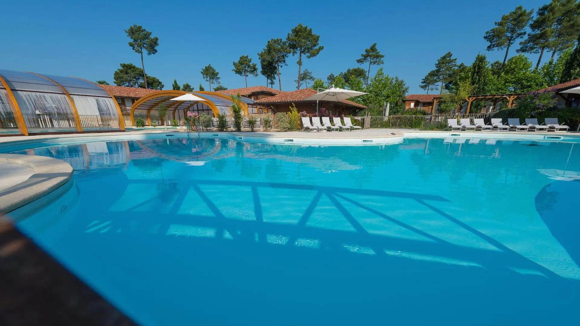Swimming pool in Les Cottages Du Lac