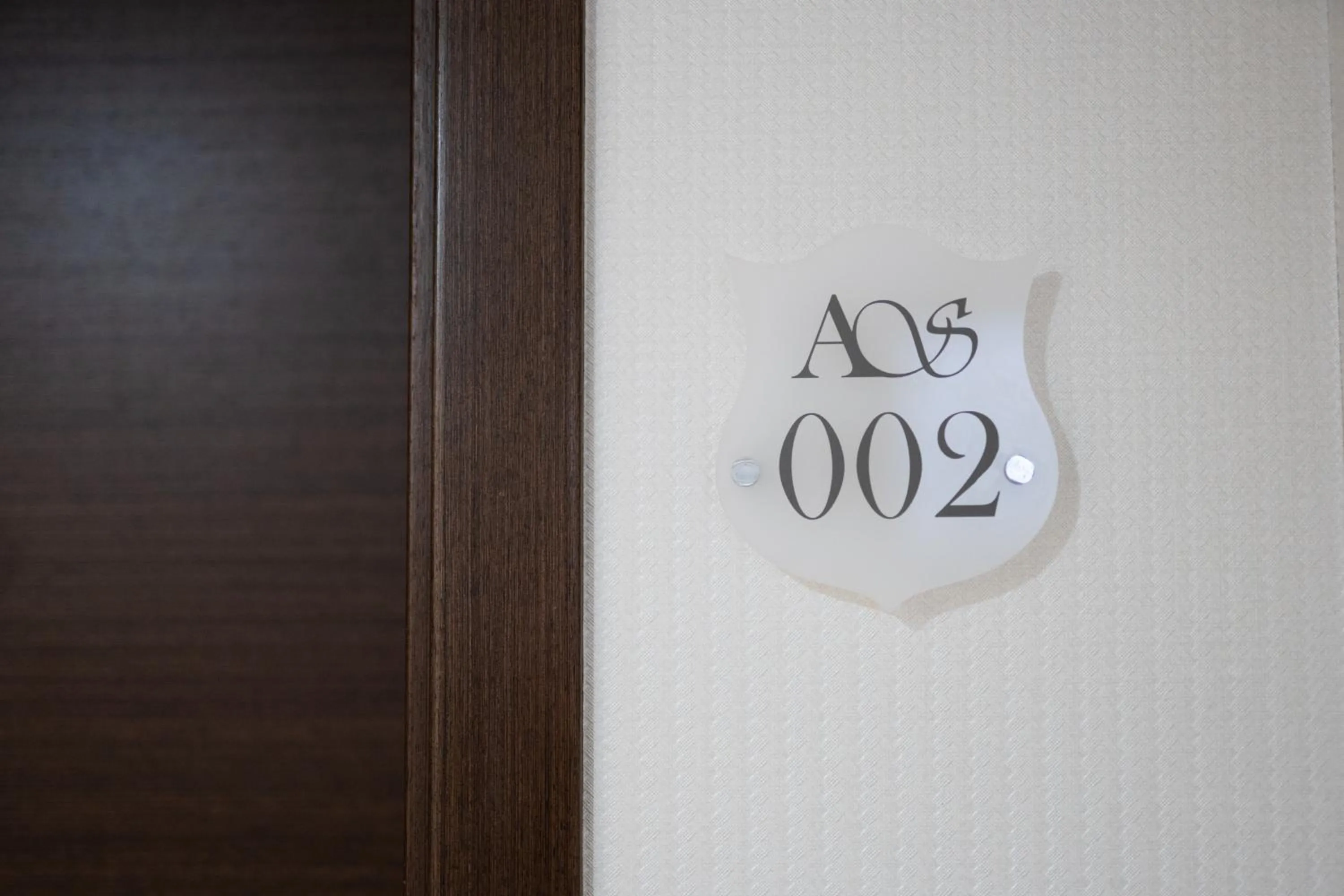 Property logo or sign in Alvear Suites